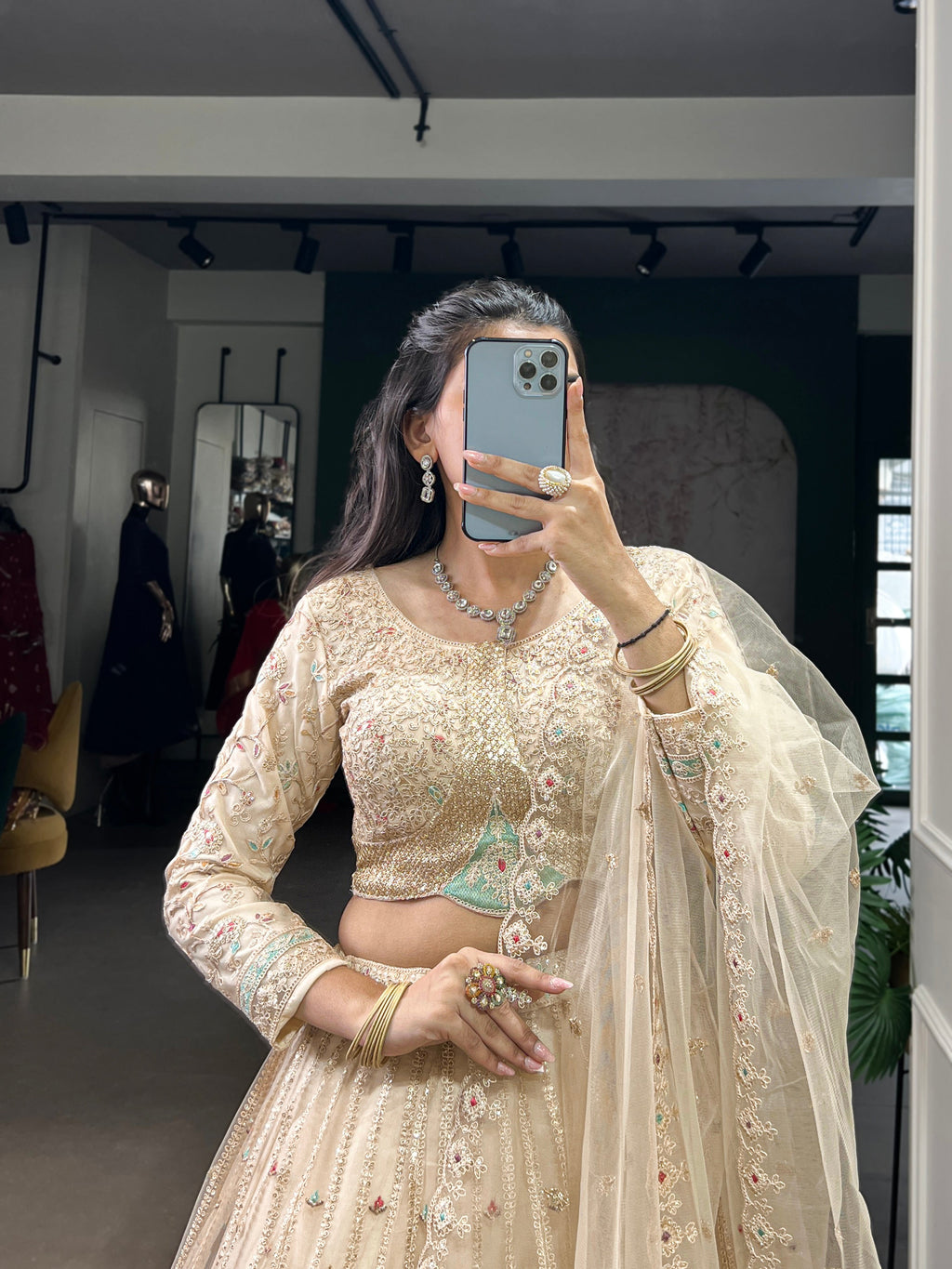 Cream net sequins thread embroidery lehenga choli with dupatta