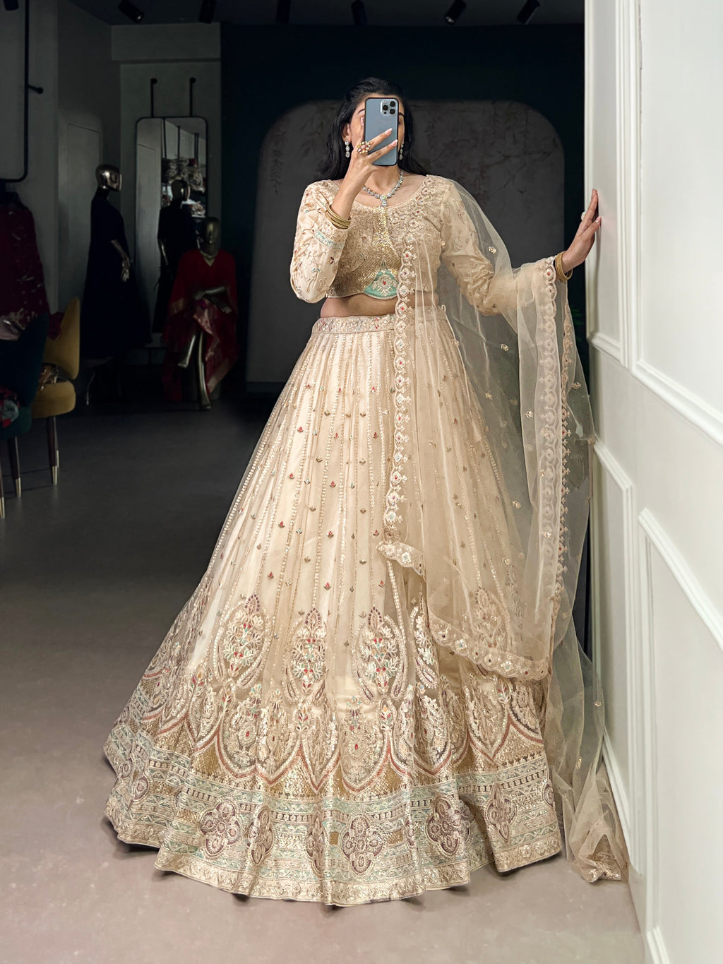 Cream net sequins thread embroidery lehenga choli with dupatta