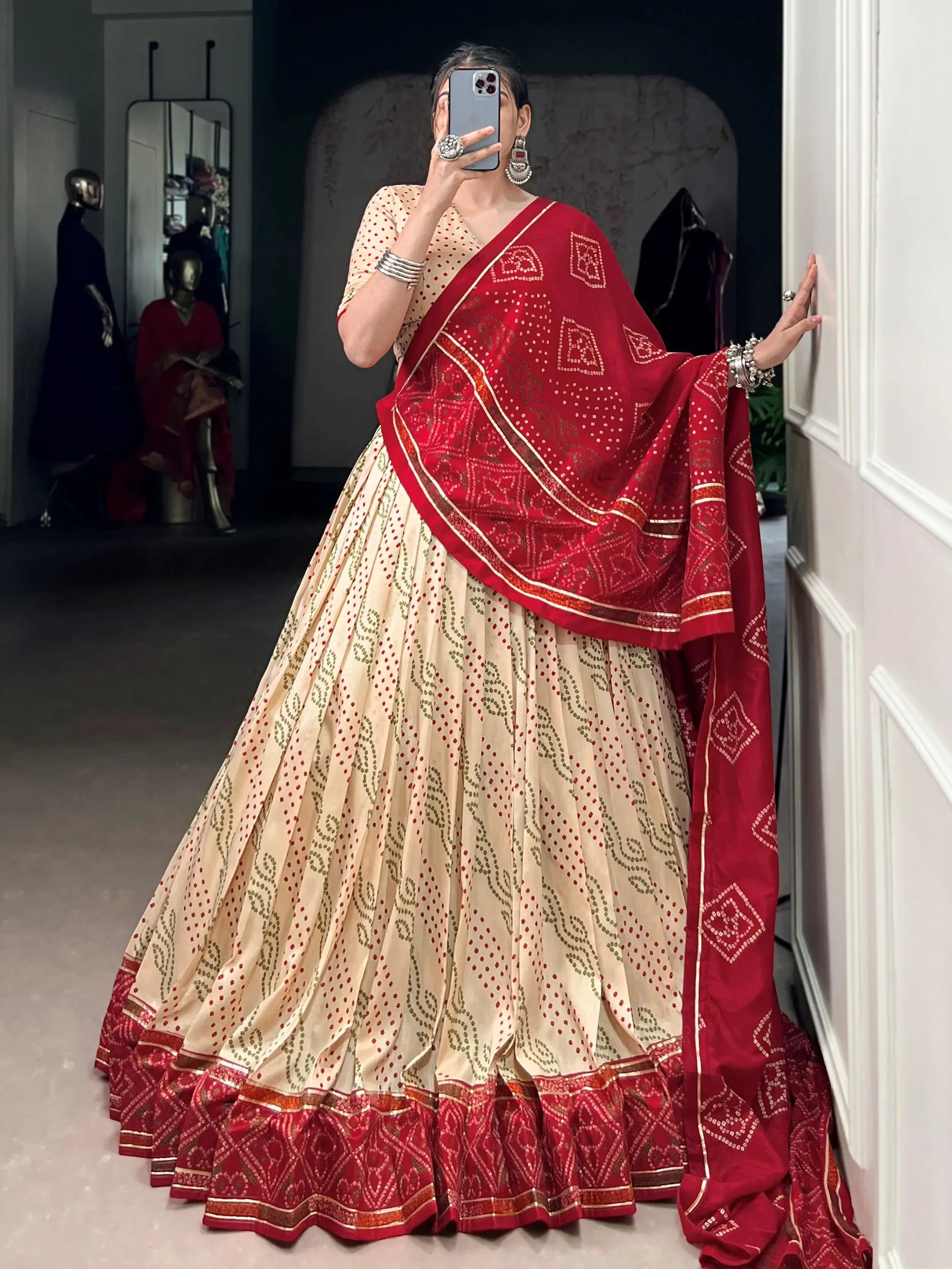 Cream silk bandhani print lehenga choli with gotta patti lace work