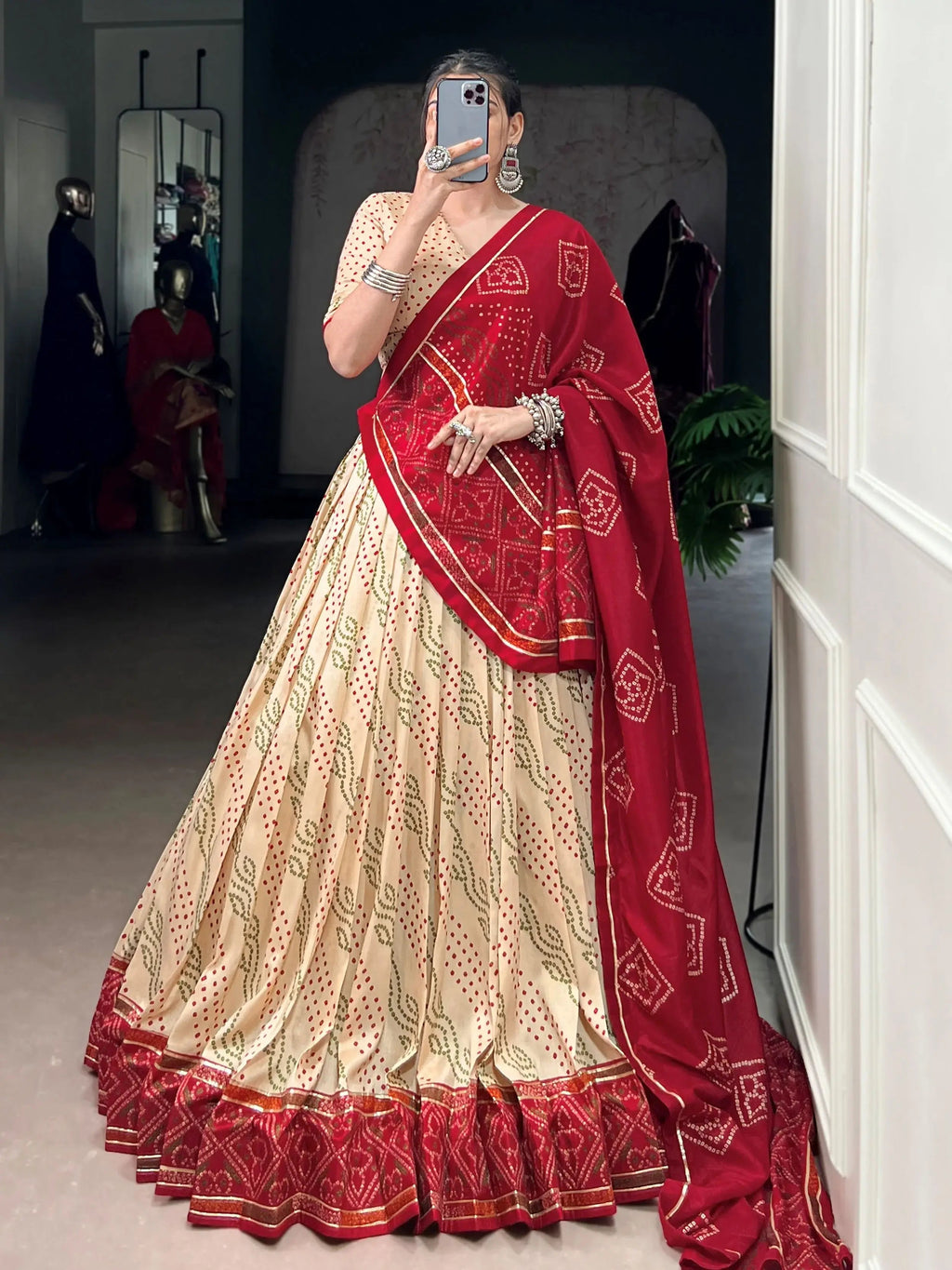 Cream silk bandhani print lehenga choli with gotta patti lace work