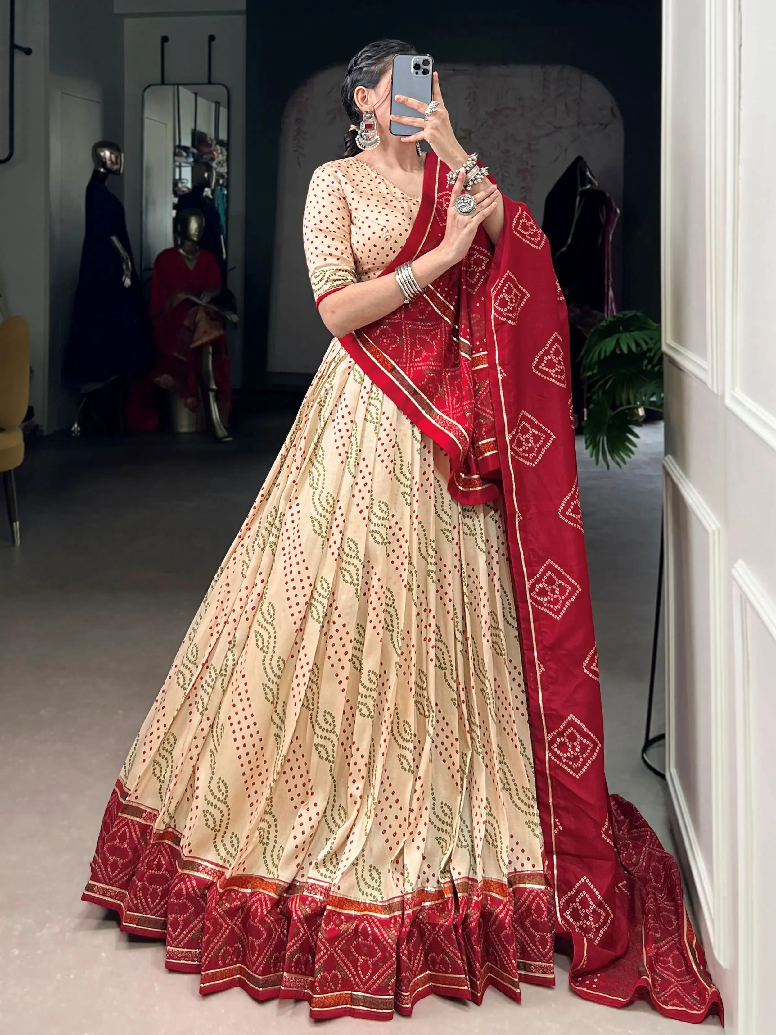 Cream silk bandhani print lehenga choli with gotta patti lace work