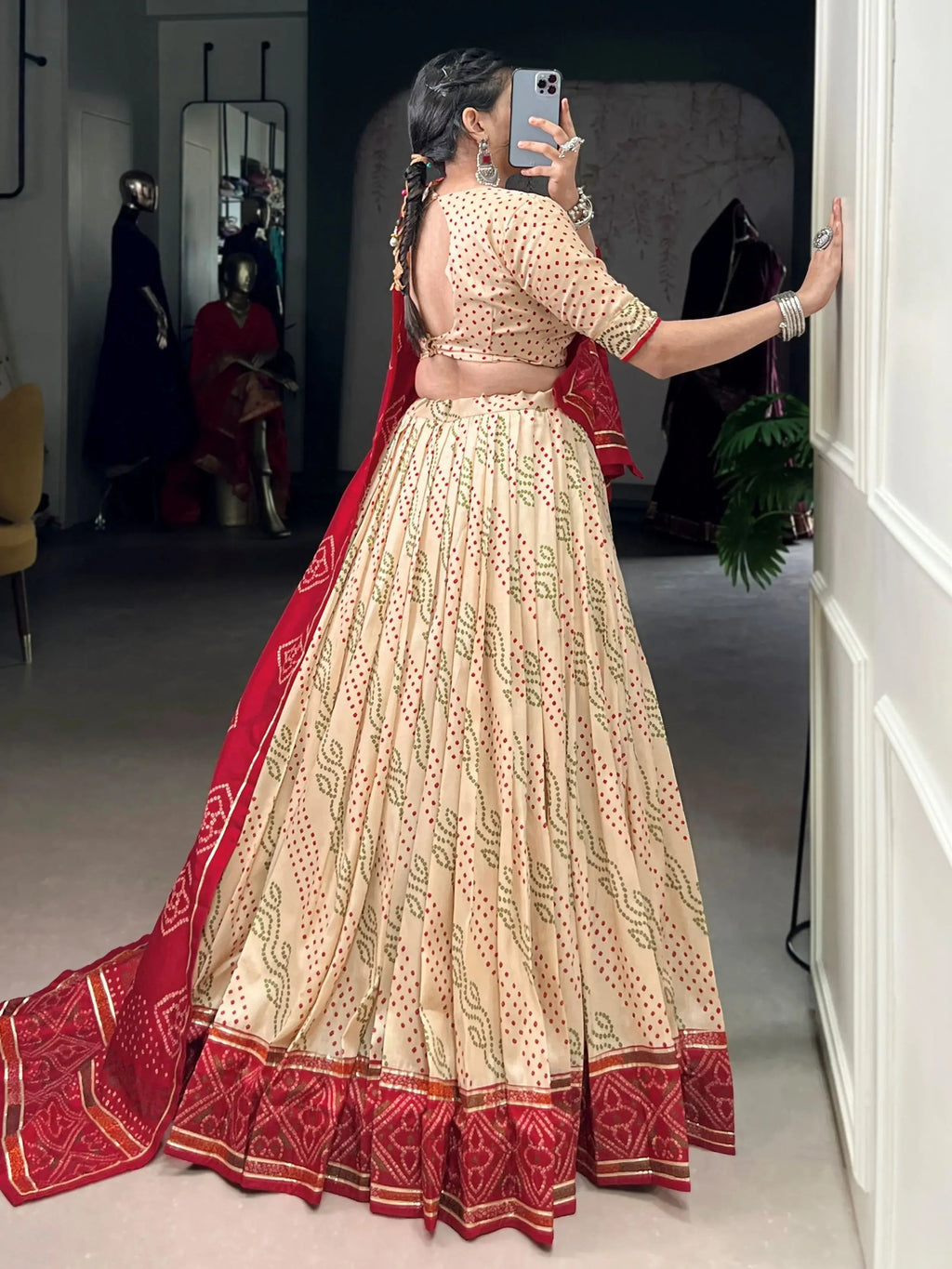 Cream silk bandhani print lehenga choli with gotta patti lace work
