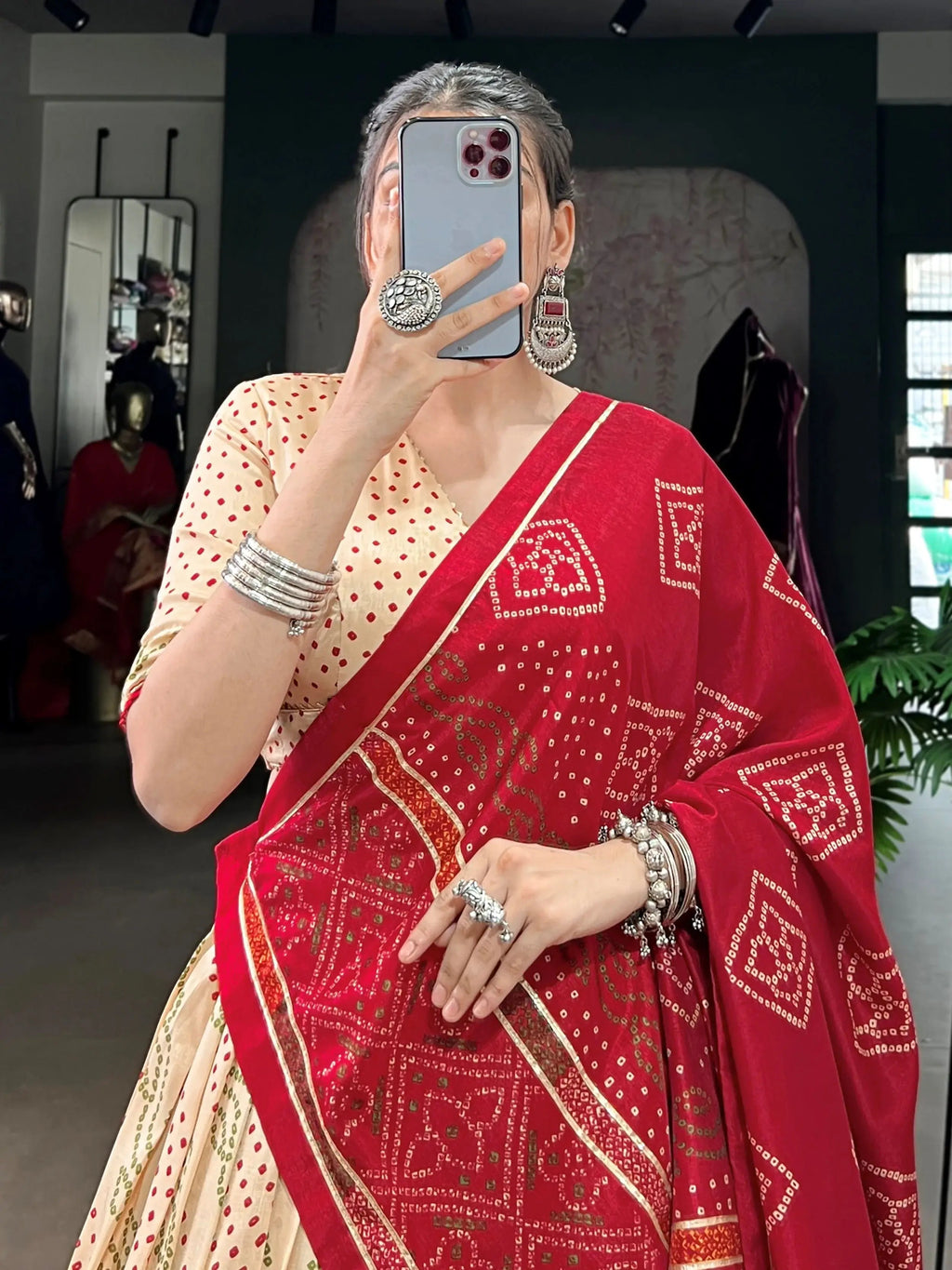 Cream silk bandhani print lehenga choli with gotta patti lace work