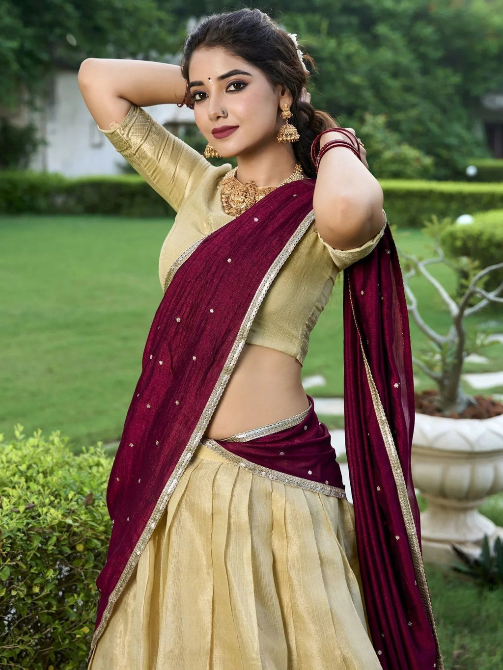 Cream kanchipuram silk lehenga choli with zari weaving and sequins embroidery