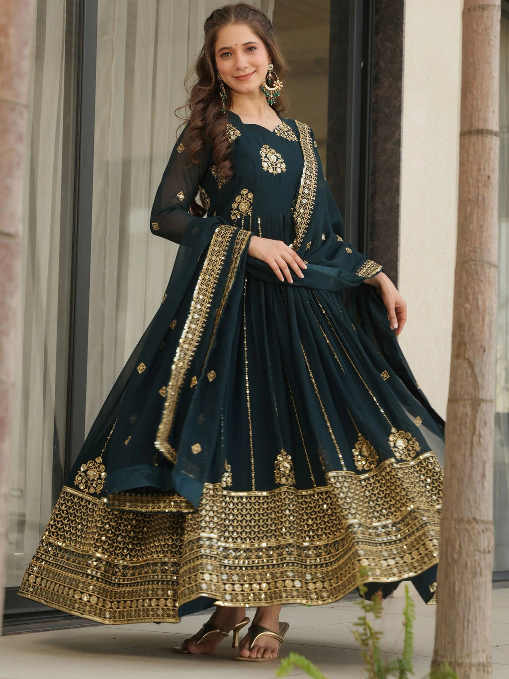 Emerald green georgette gown with zari and sequins embroidery and dupatta