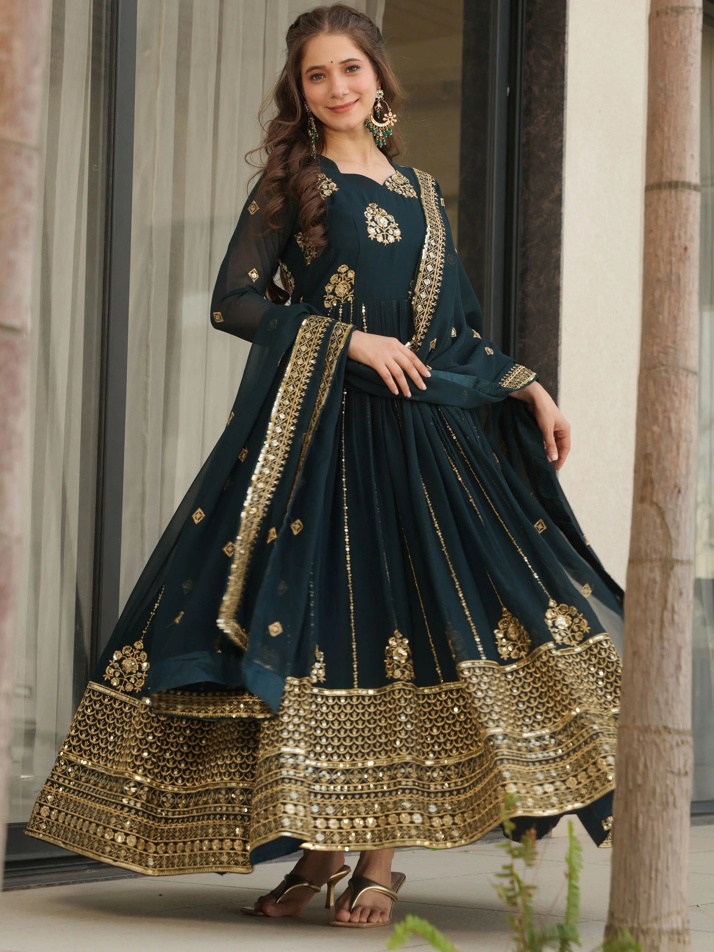 Emerald green georgette gown with zari and sequins embroidery and dupatta
