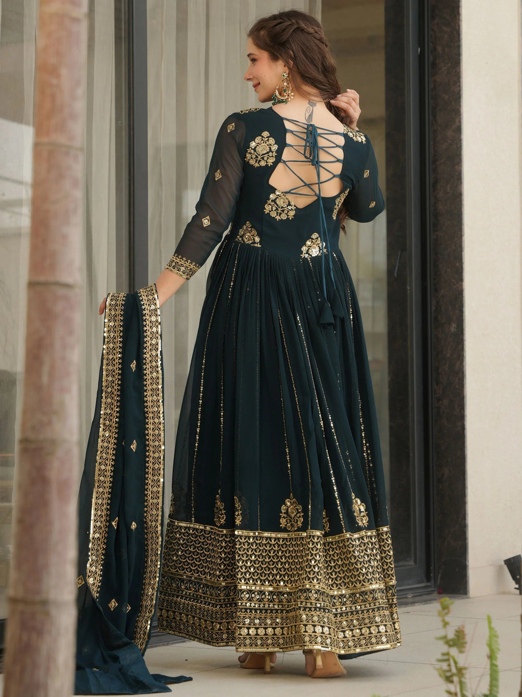 Emerald green georgette gown with zari and sequins embroidery and dupatta