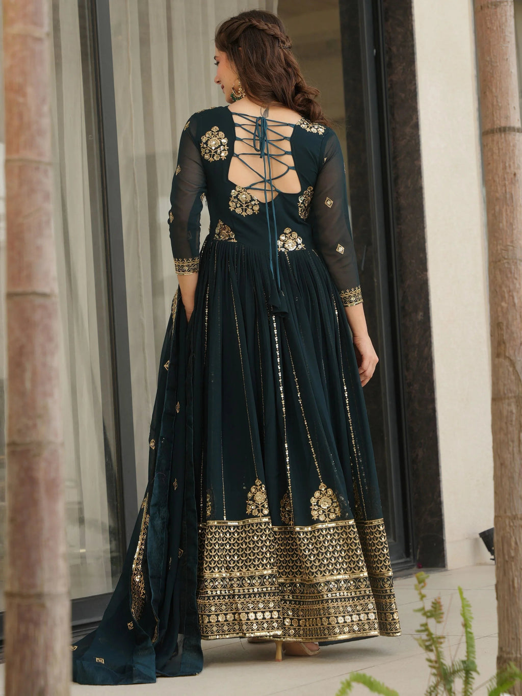 Emerald green georgette gown with zari and sequins embroidery and dupatta