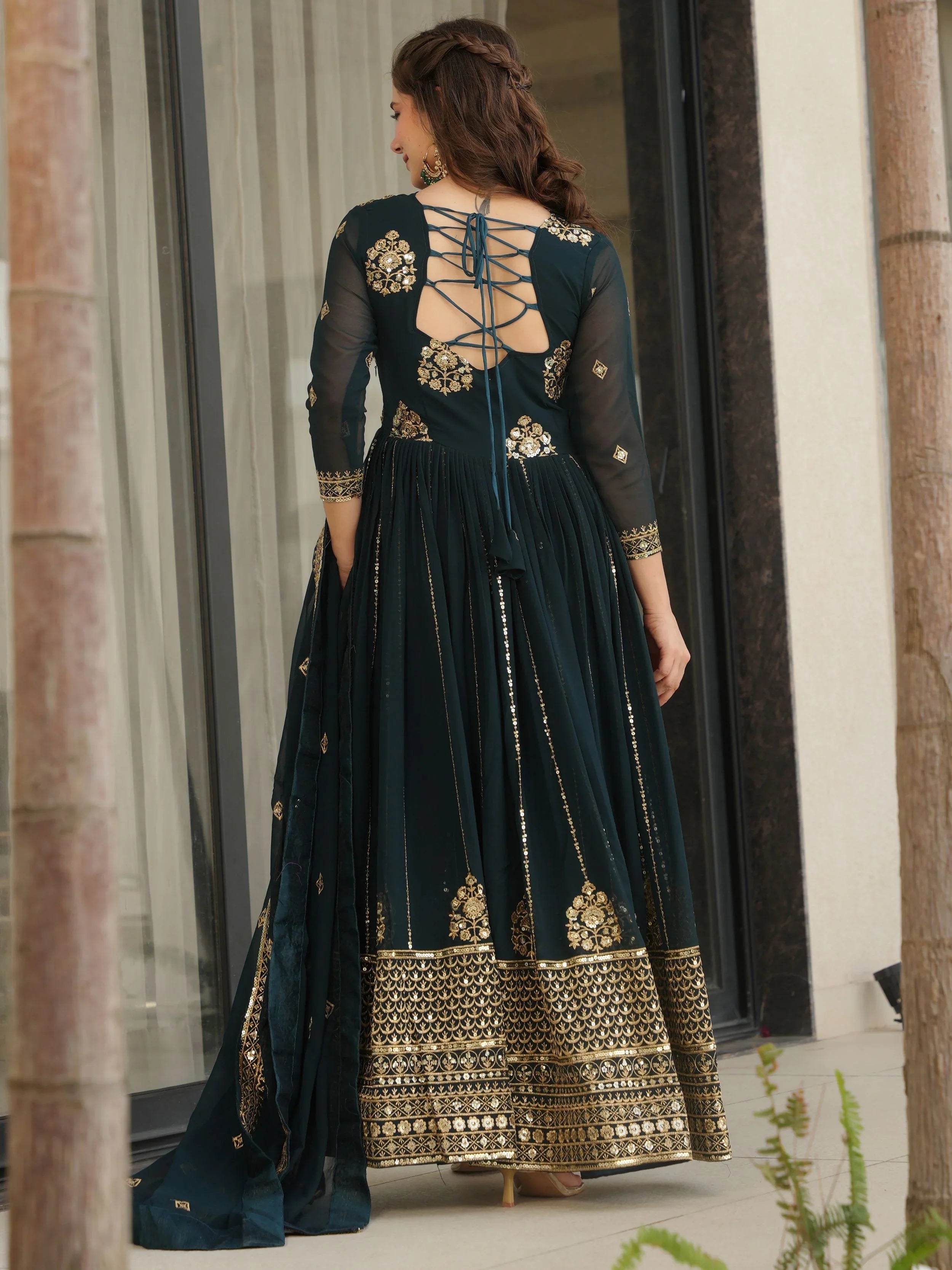 Emerald green georgette gown with zari and sequins embroidery and dupatta