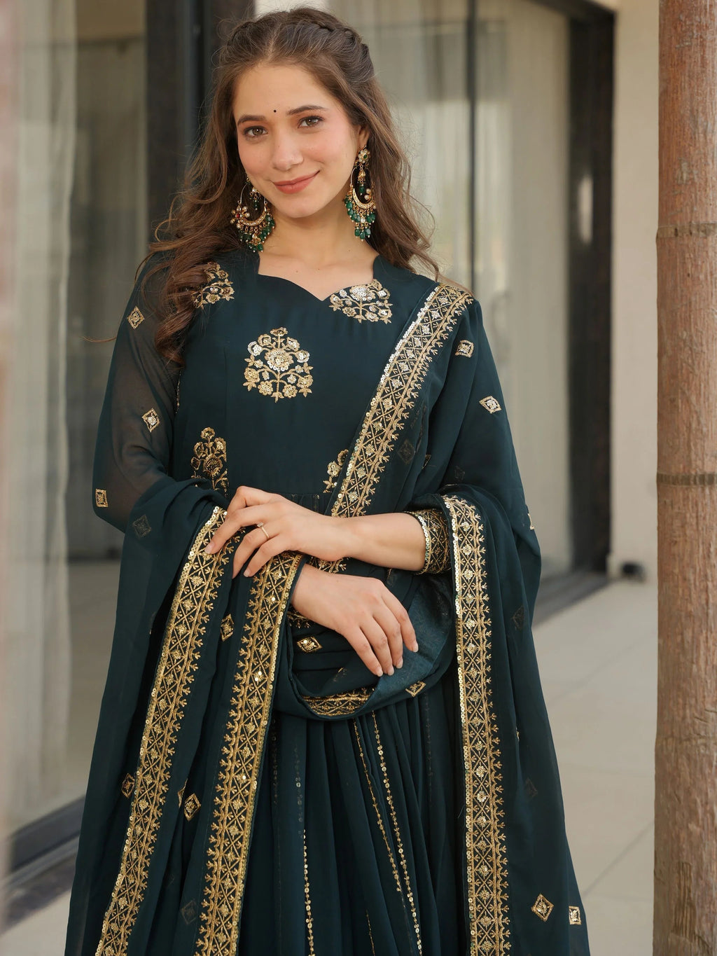 Emerald green georgette gown with zari and sequins embroidery and dupatta