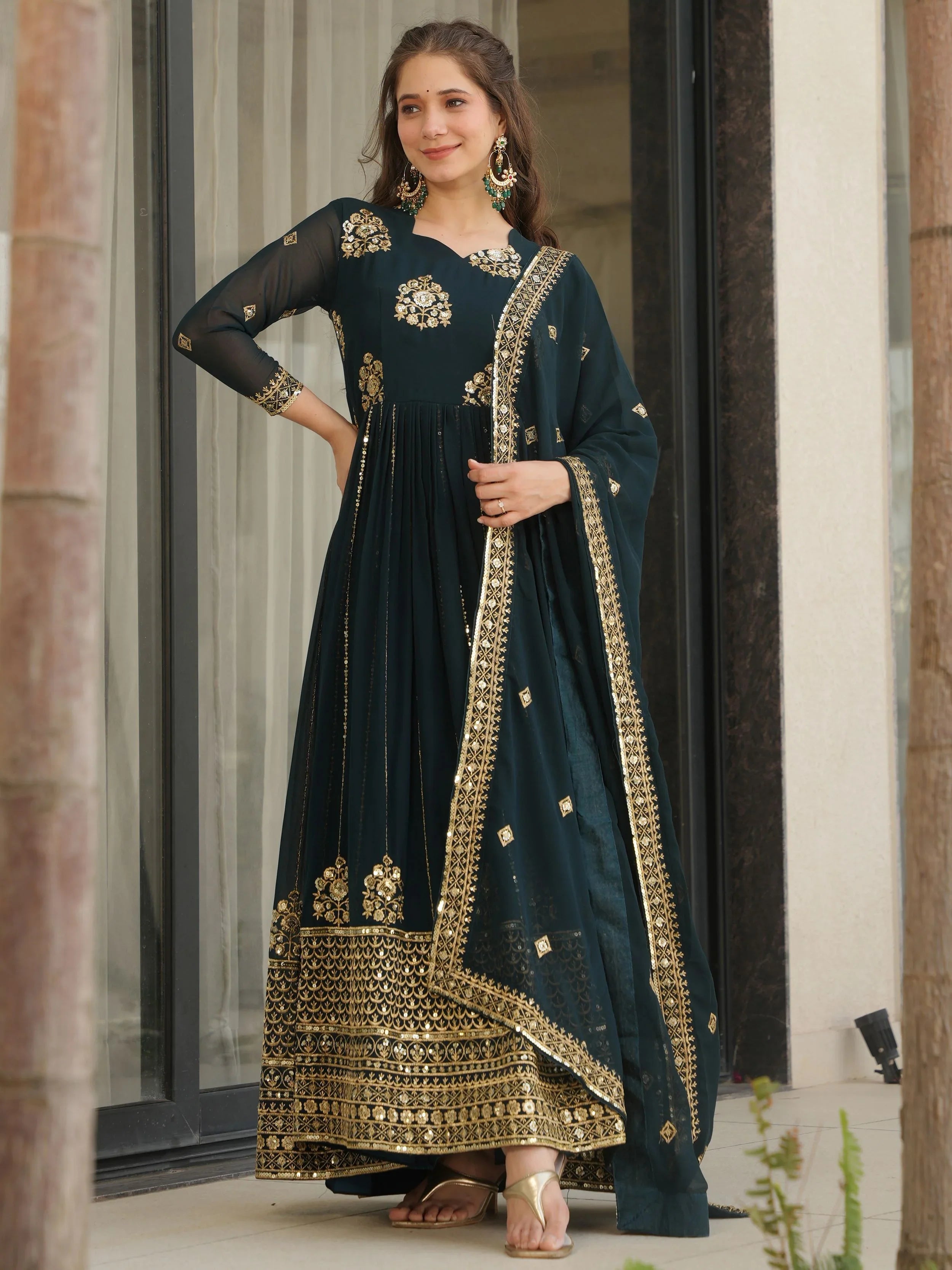 Emerald green georgette gown with zari and sequins embroidery and dupatta