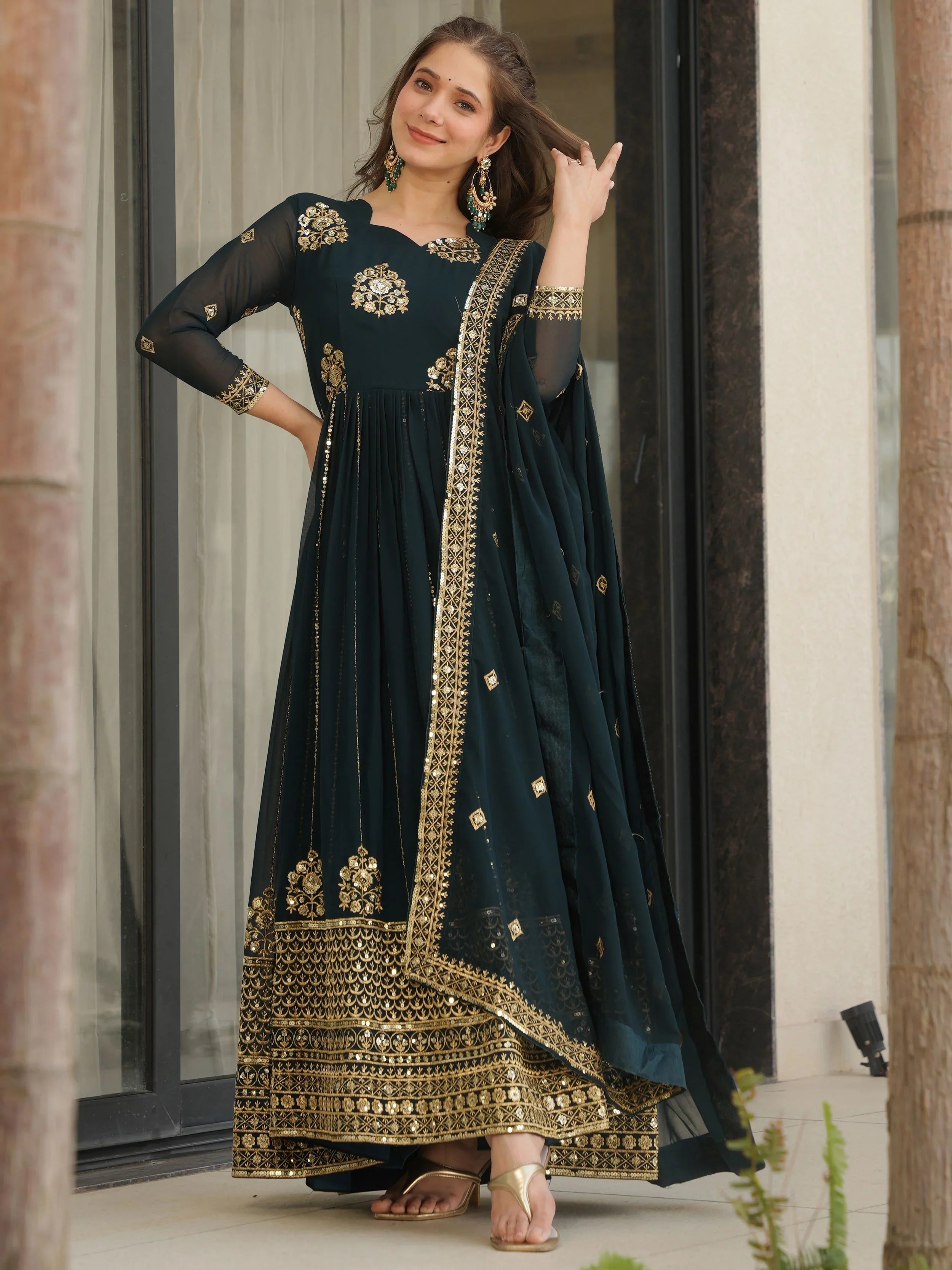 Emerald green georgette gown with zari and sequins embroidery and dupatta