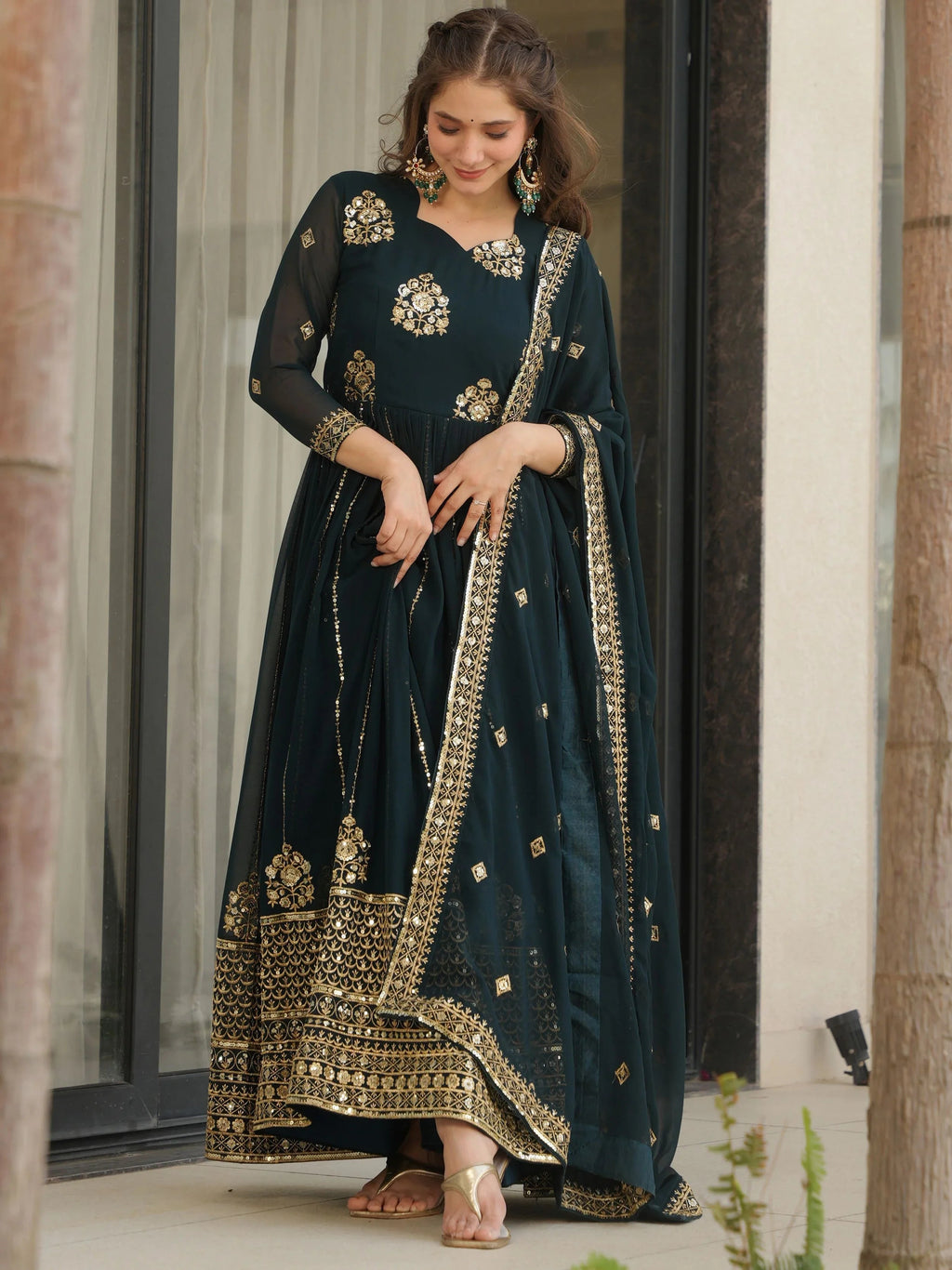 Emerald green georgette gown with zari and sequins embroidery and dupatta