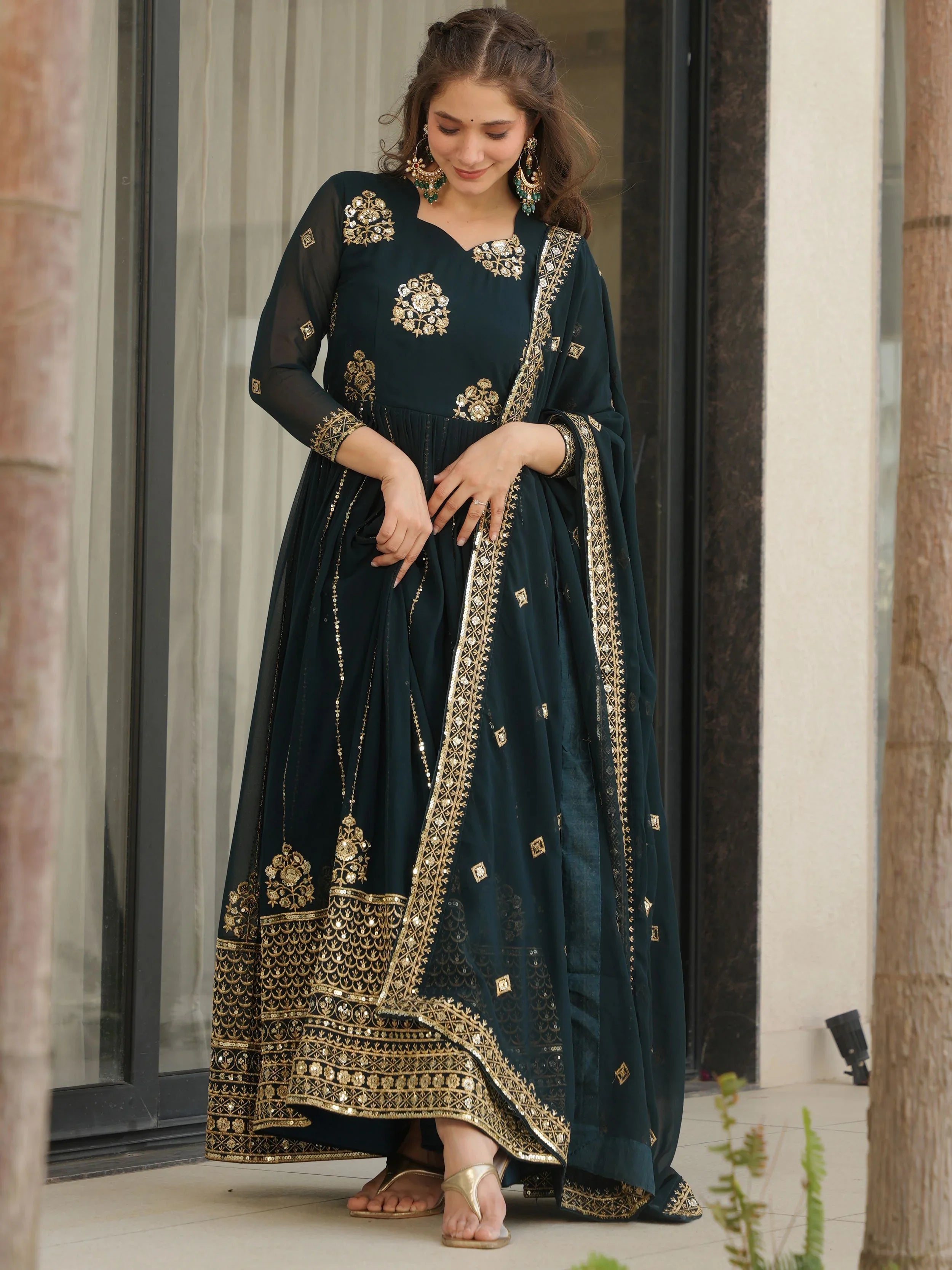 Emerald green georgette gown with zari and sequins embroidery and dupatta