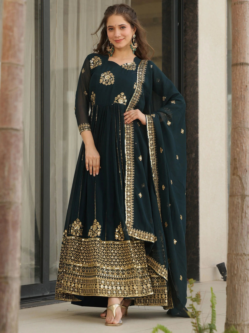 Emerald green georgette gown with zari and sequins embroidery and dupatta