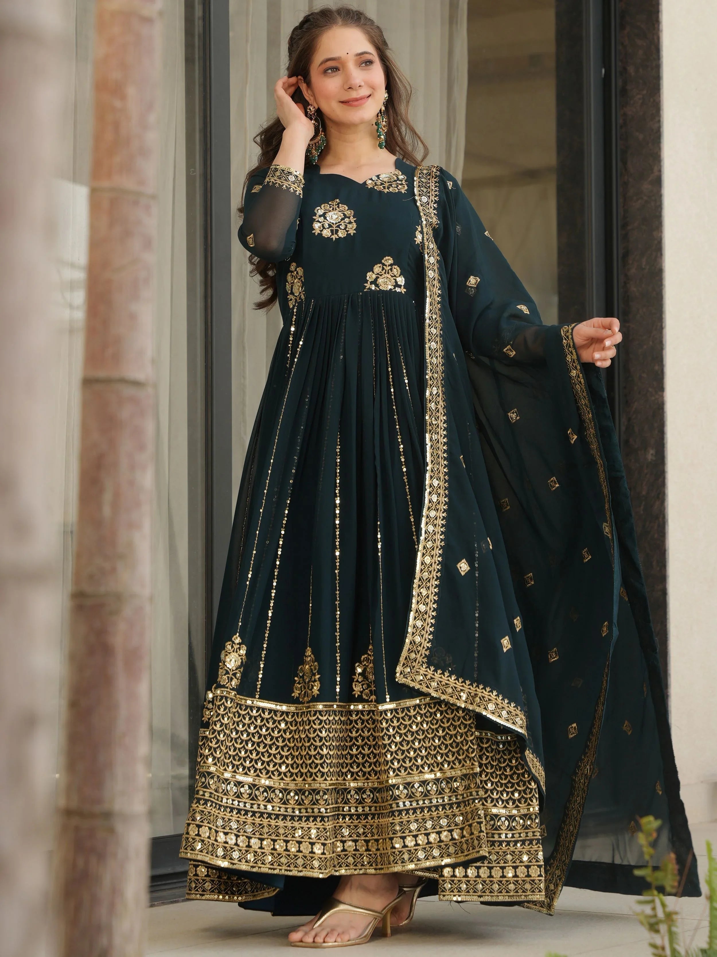 Emerald green georgette gown with zari and sequins embroidery and dupatta