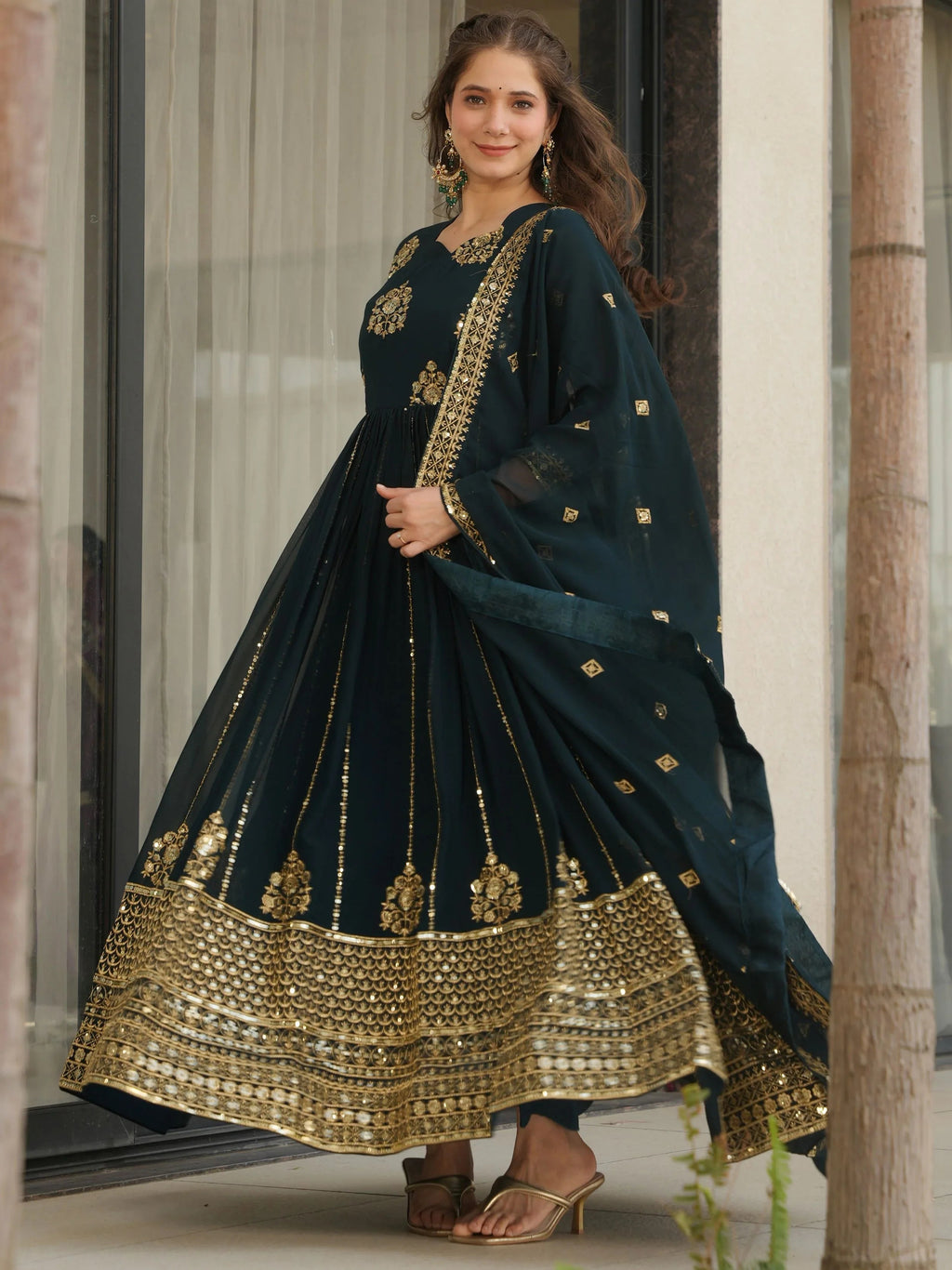 Emerald green georgette gown with zari and sequins embroidery and dupatta