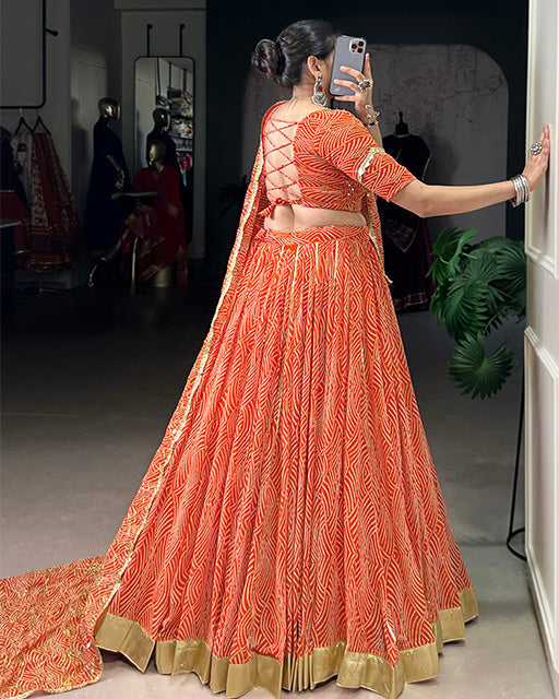 Orange soft georgette Bandhej print lehenga choli with dupatta