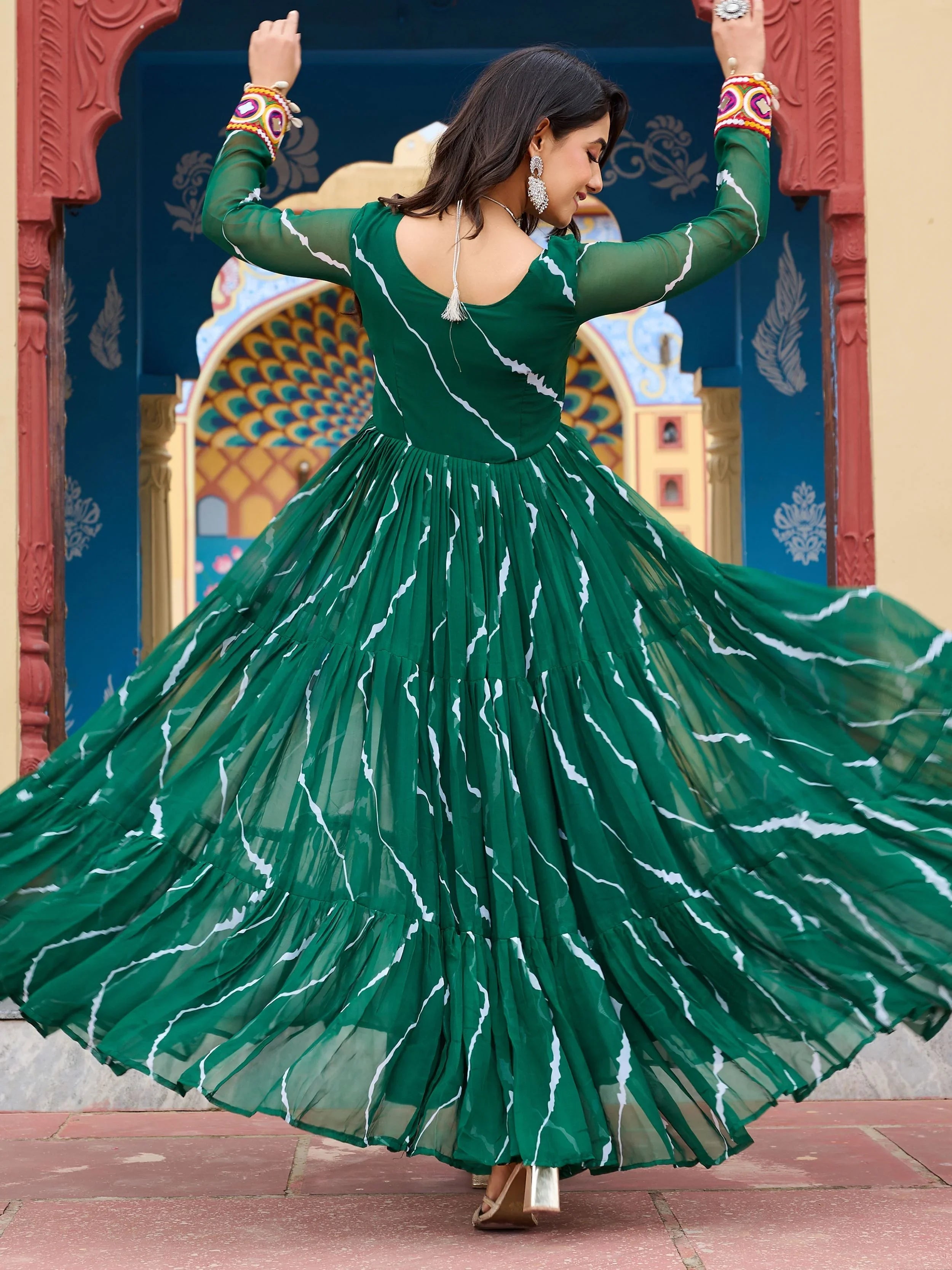 Green bandhani print georgette navratri gown with kutchi patchwork