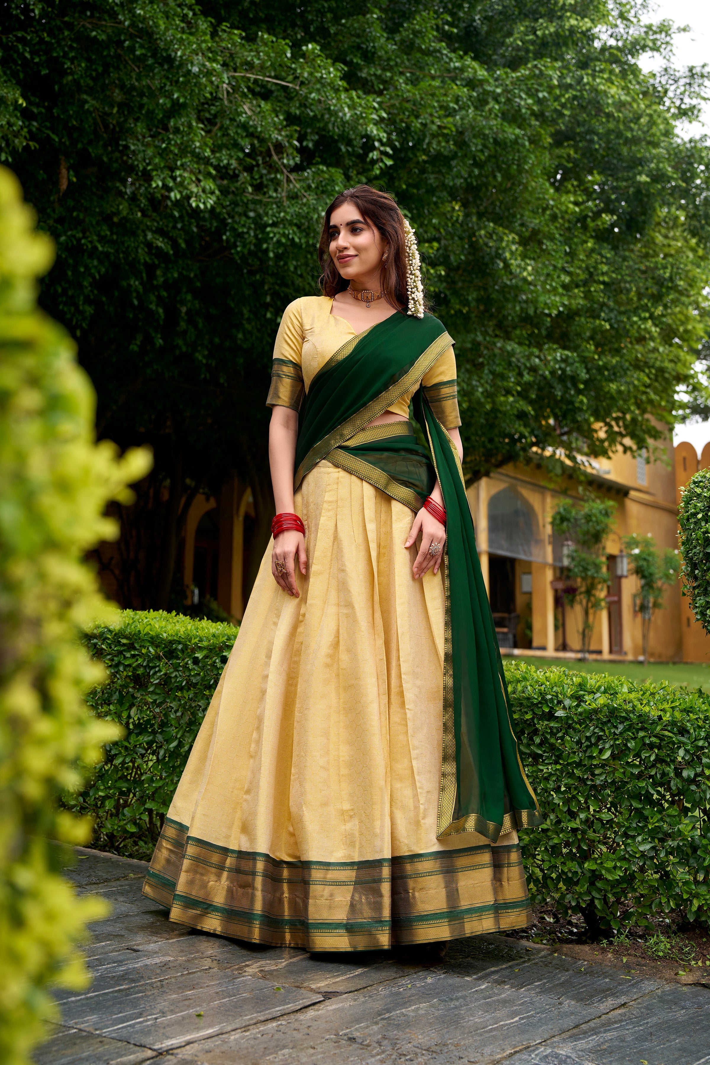 Green Kanchipuram silk zari weaving half saree lehenga choli