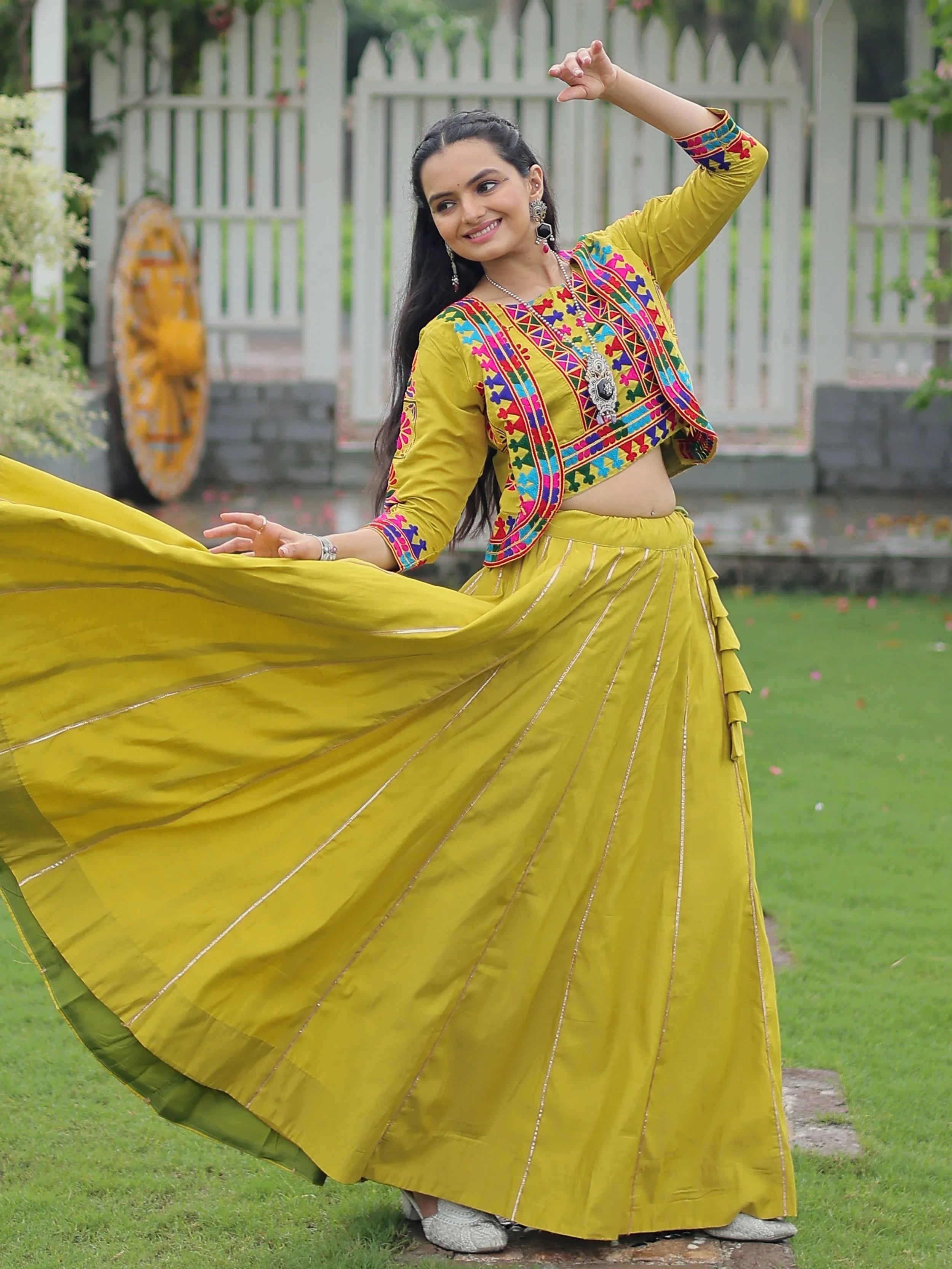 Green Kutchi Gamthi embroidered Gota Patti lace lehenga choli with koti