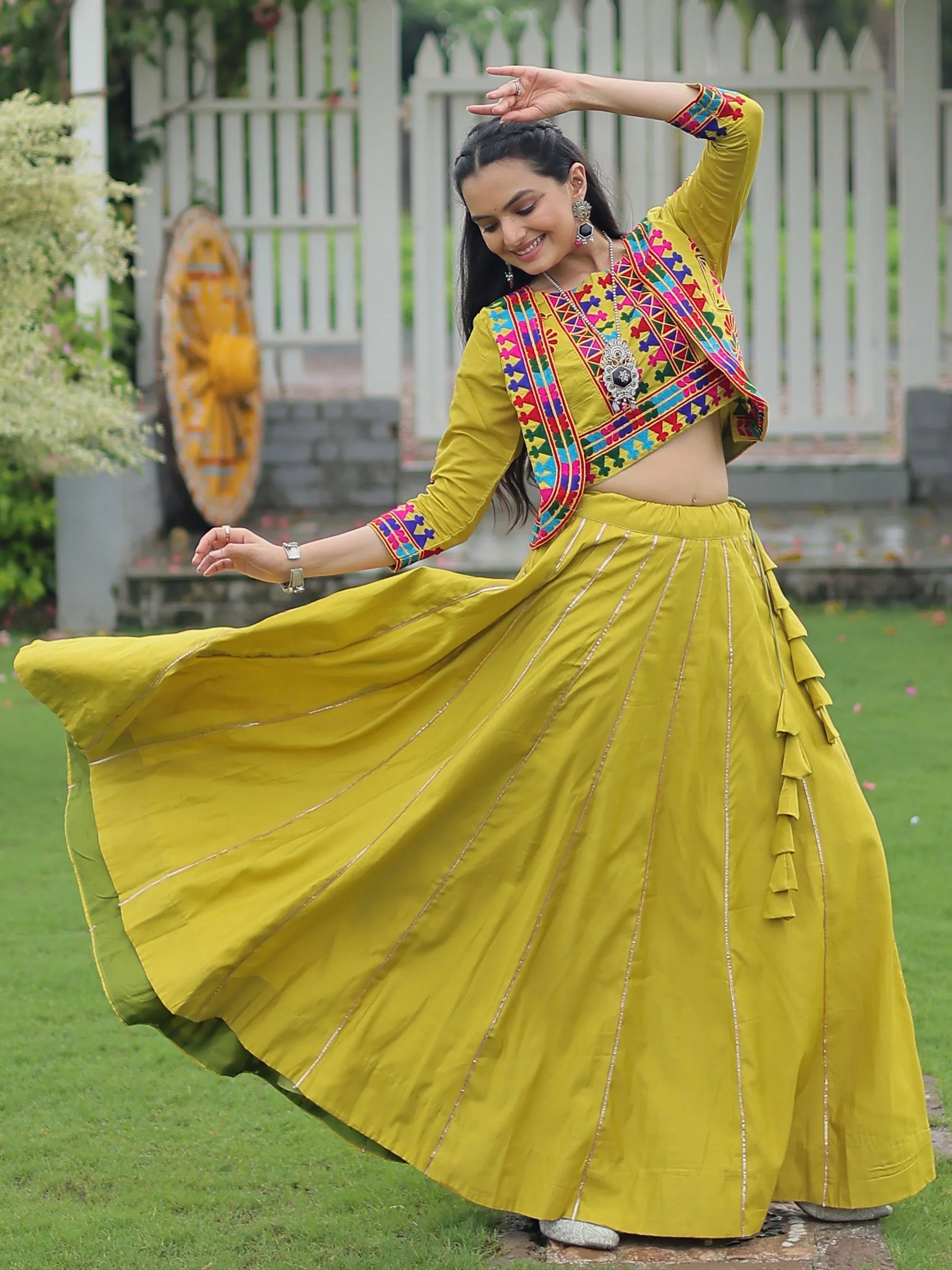 Green Kutchi Gamthi embroidered Gota Patti lace lehenga choli with koti