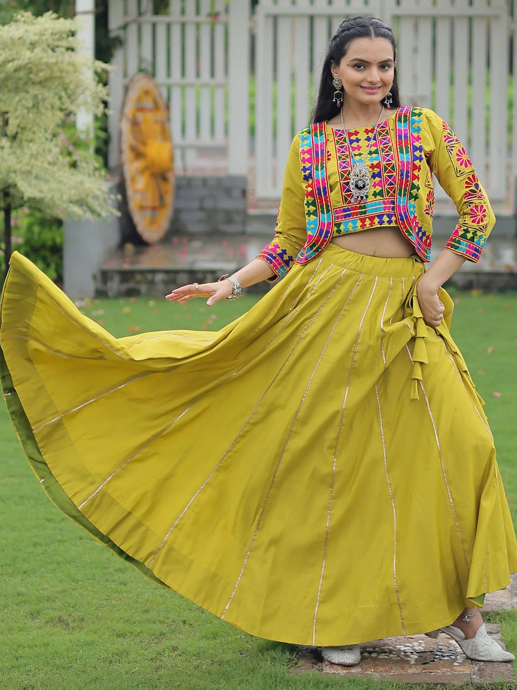 Green Kutchi Gamthi embroidered Gota Patti lace lehenga choli with koti