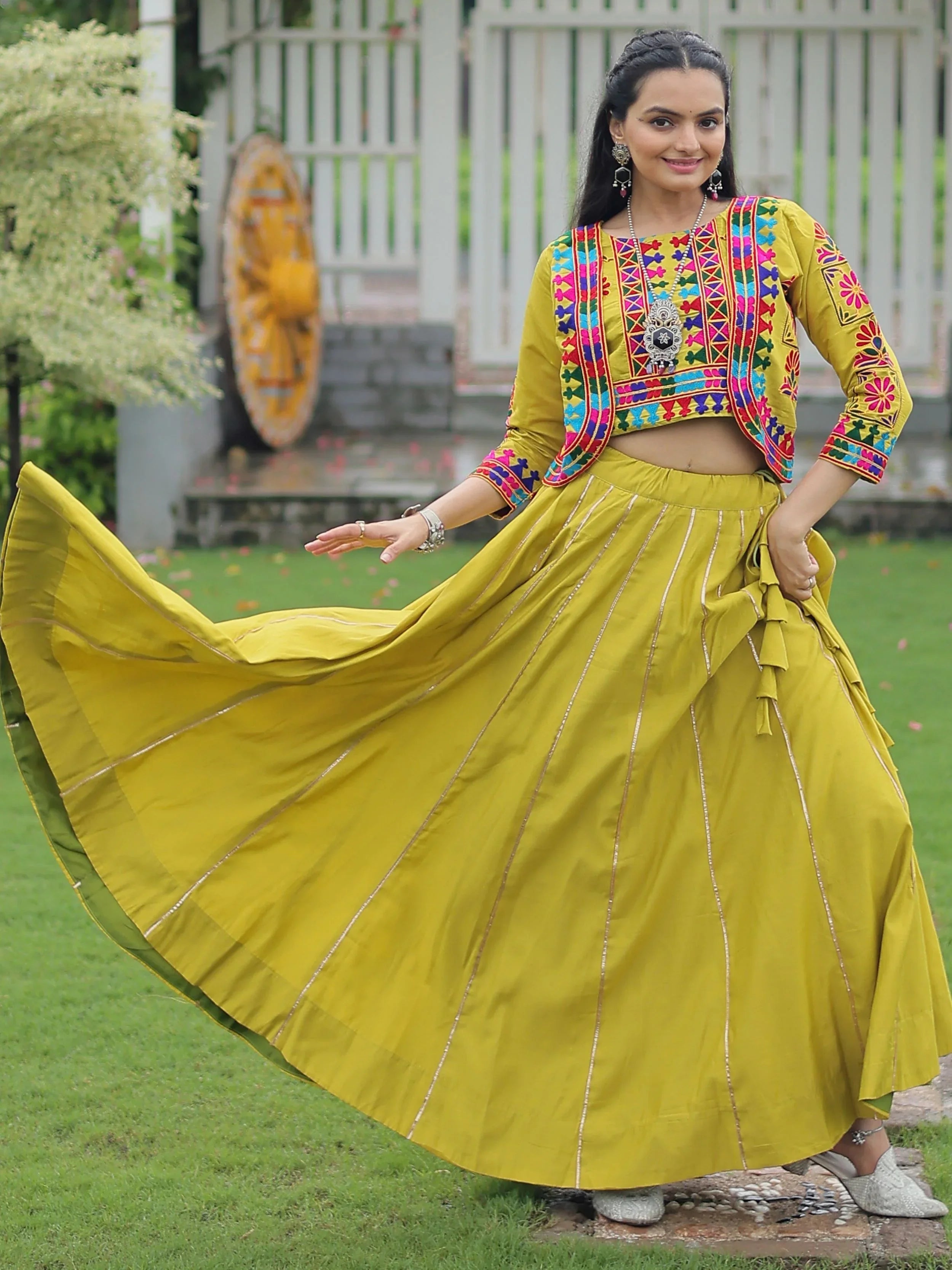 Green Kutchi Gamthi embroidered Gota Patti lace lehenga choli with koti