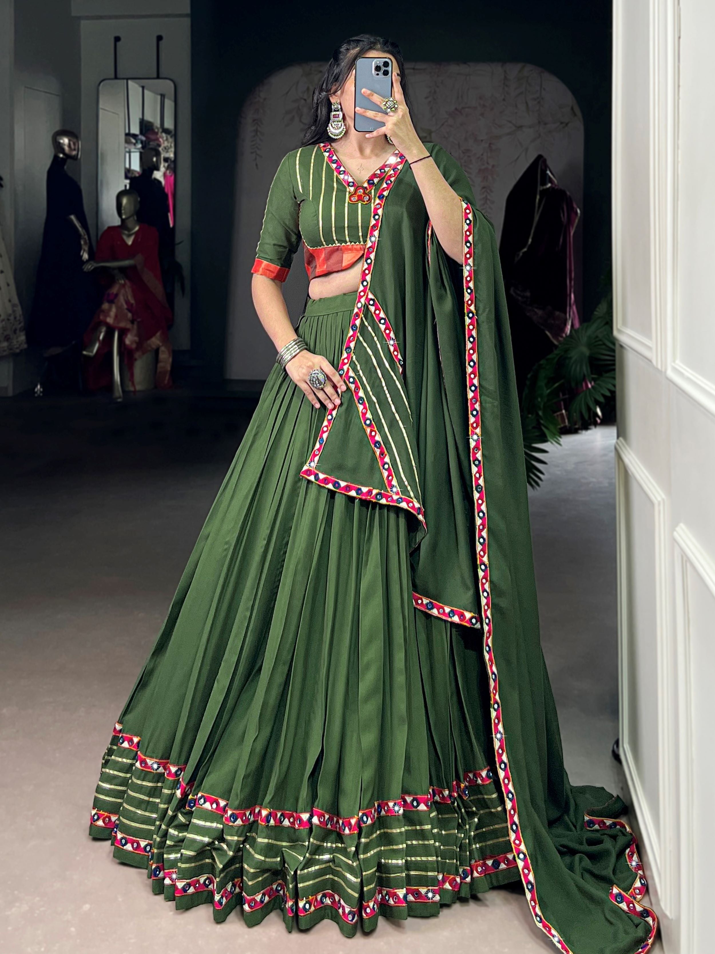 Green pure rayon lehenga choli with mirror gamthi and gotta patti work