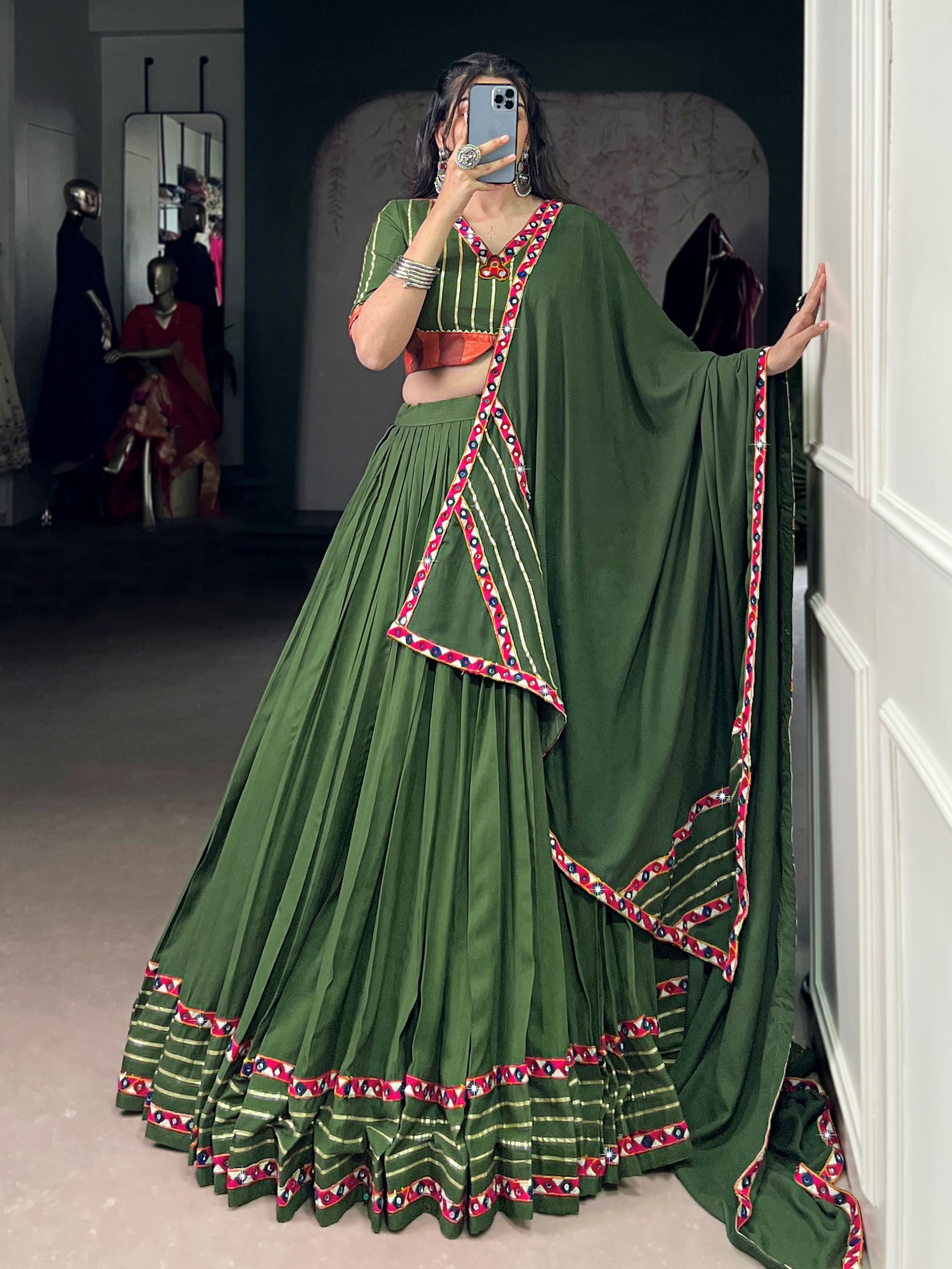 Green pure rayon lehenga choli with mirror gamthi and gotta patti work