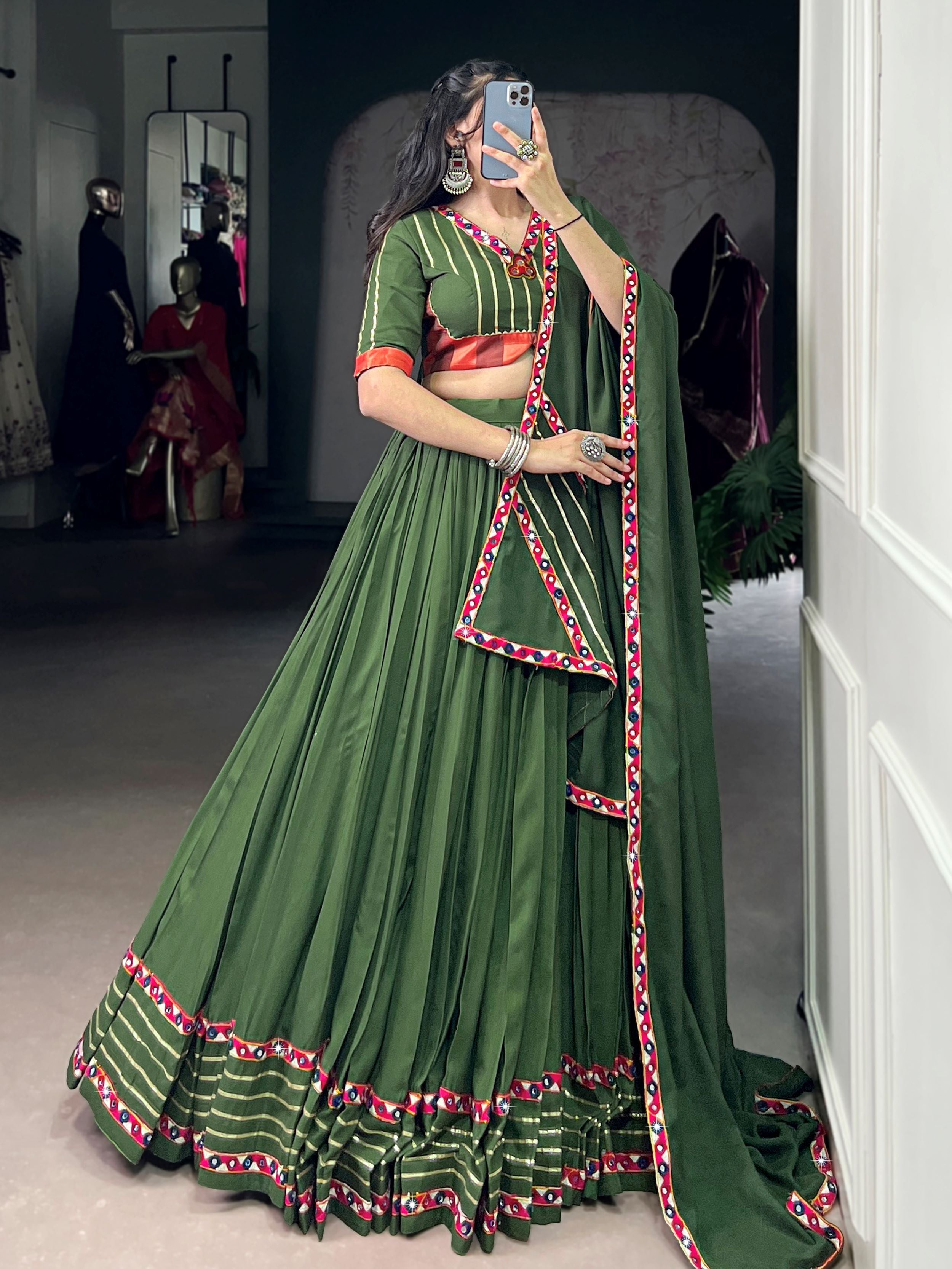 Green pure rayon lehenga choli with mirror gamthi and gotta patti work