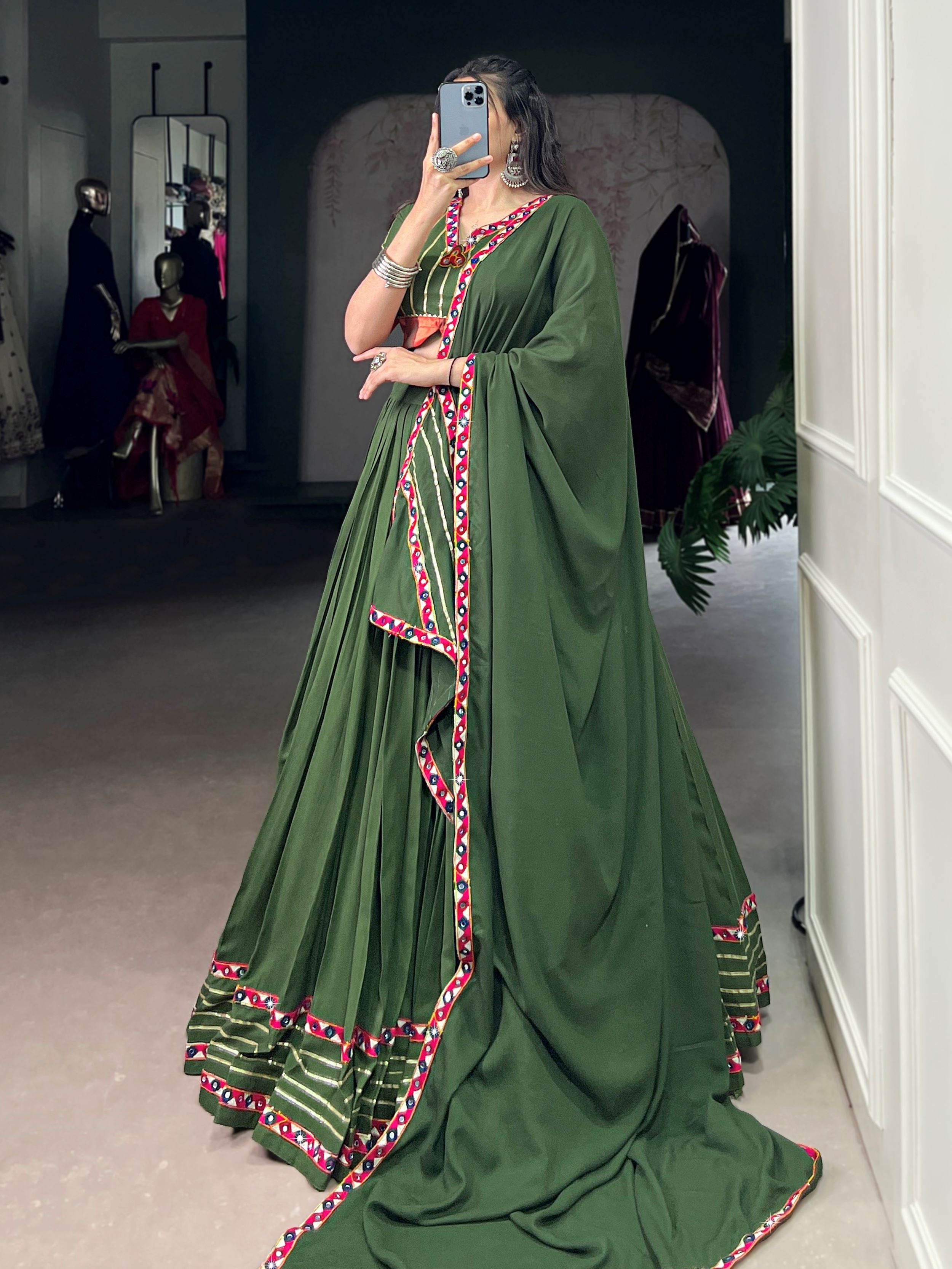 Green pure rayon lehenga choli with mirror gamthi and gotta patti work