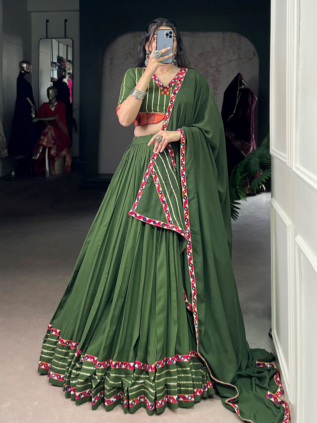 Green pure rayon lehenga choli with mirror gamthi and gotta patti work