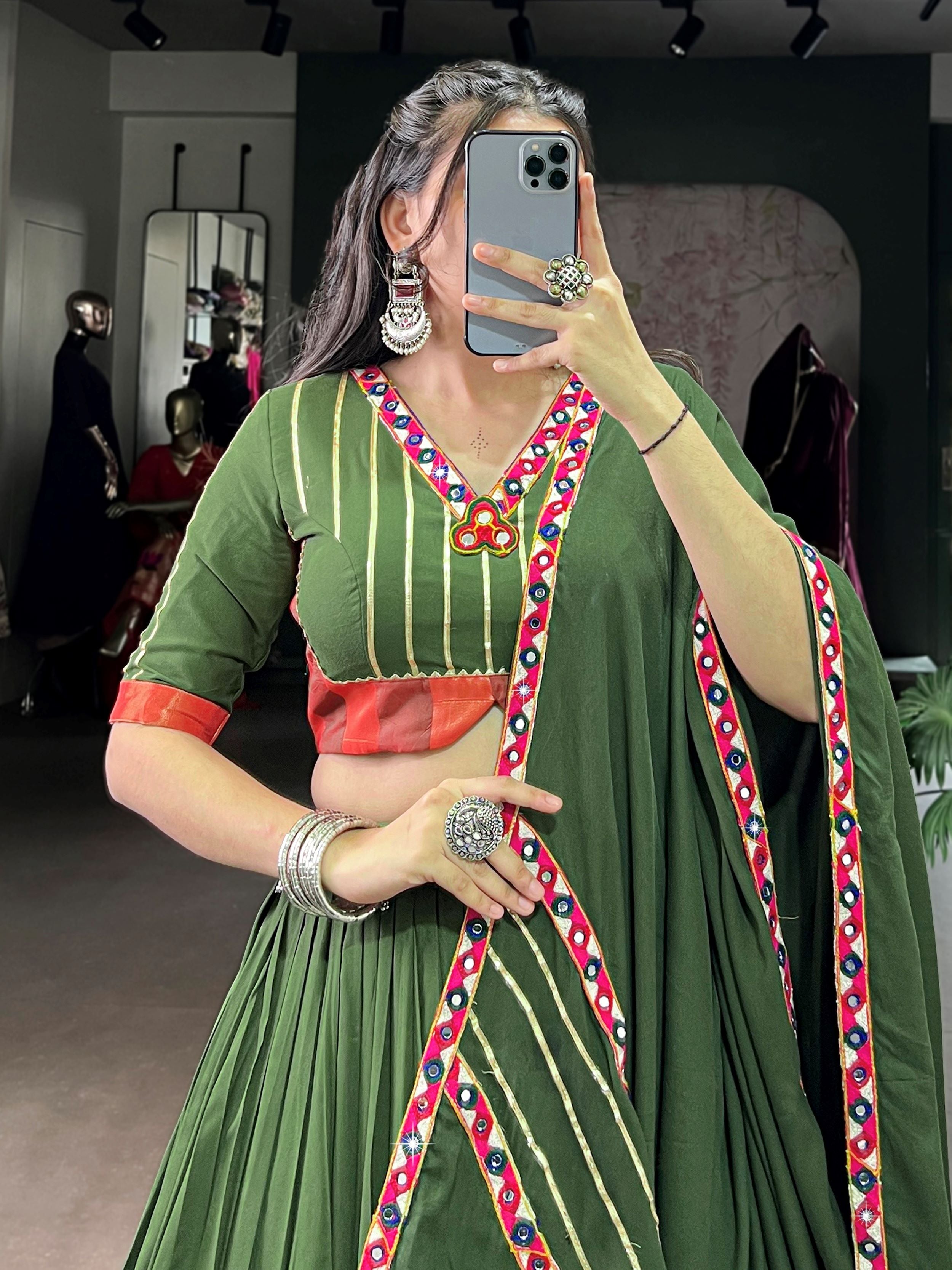Green pure rayon lehenga choli with mirror gamthi and gotta patti work