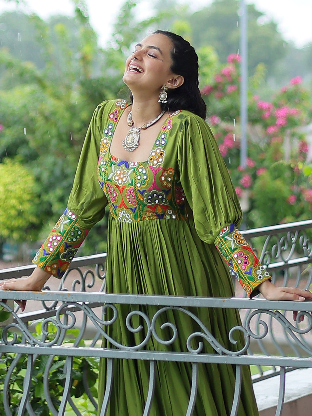 Green rayon flair gown with kutchi gamthi work for navratri