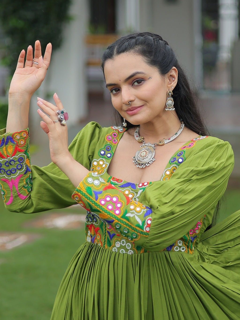 Green rayon flair gown with kutchi gamthi work for navratri