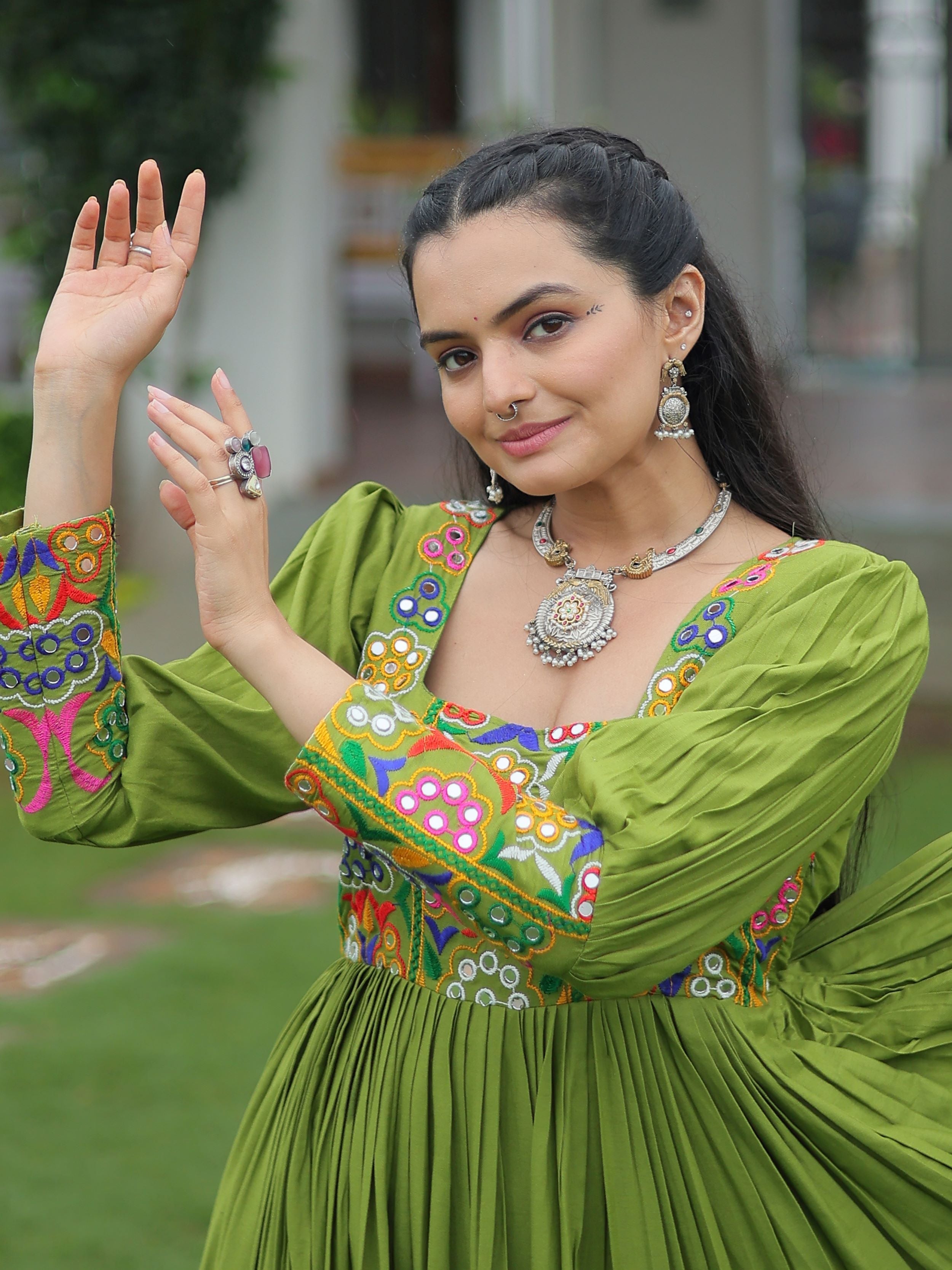 Green rayon flair gown with kutchi gamthi work for navratri