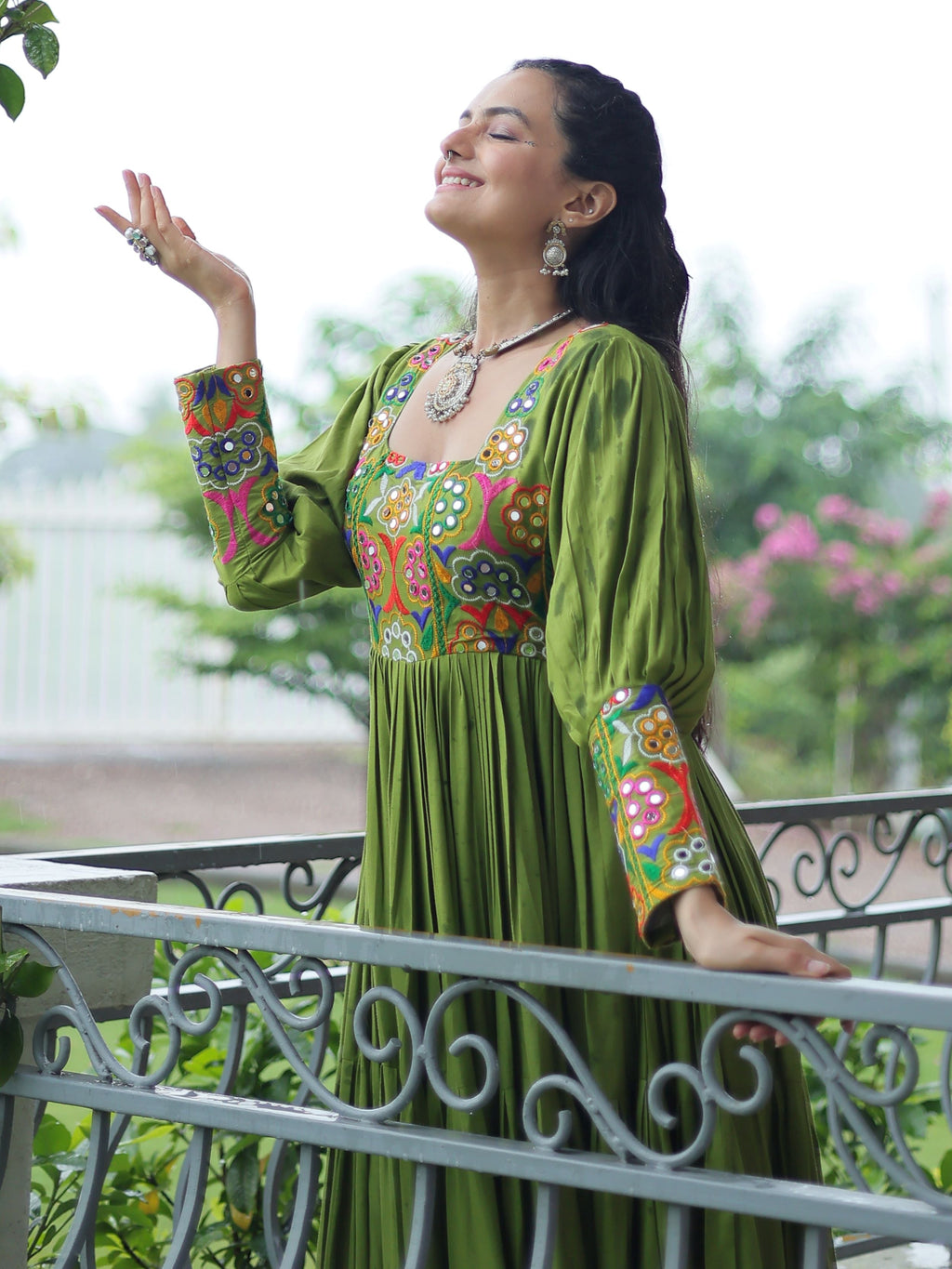Green rayon flair gown with kutchi gamthi work for navratri