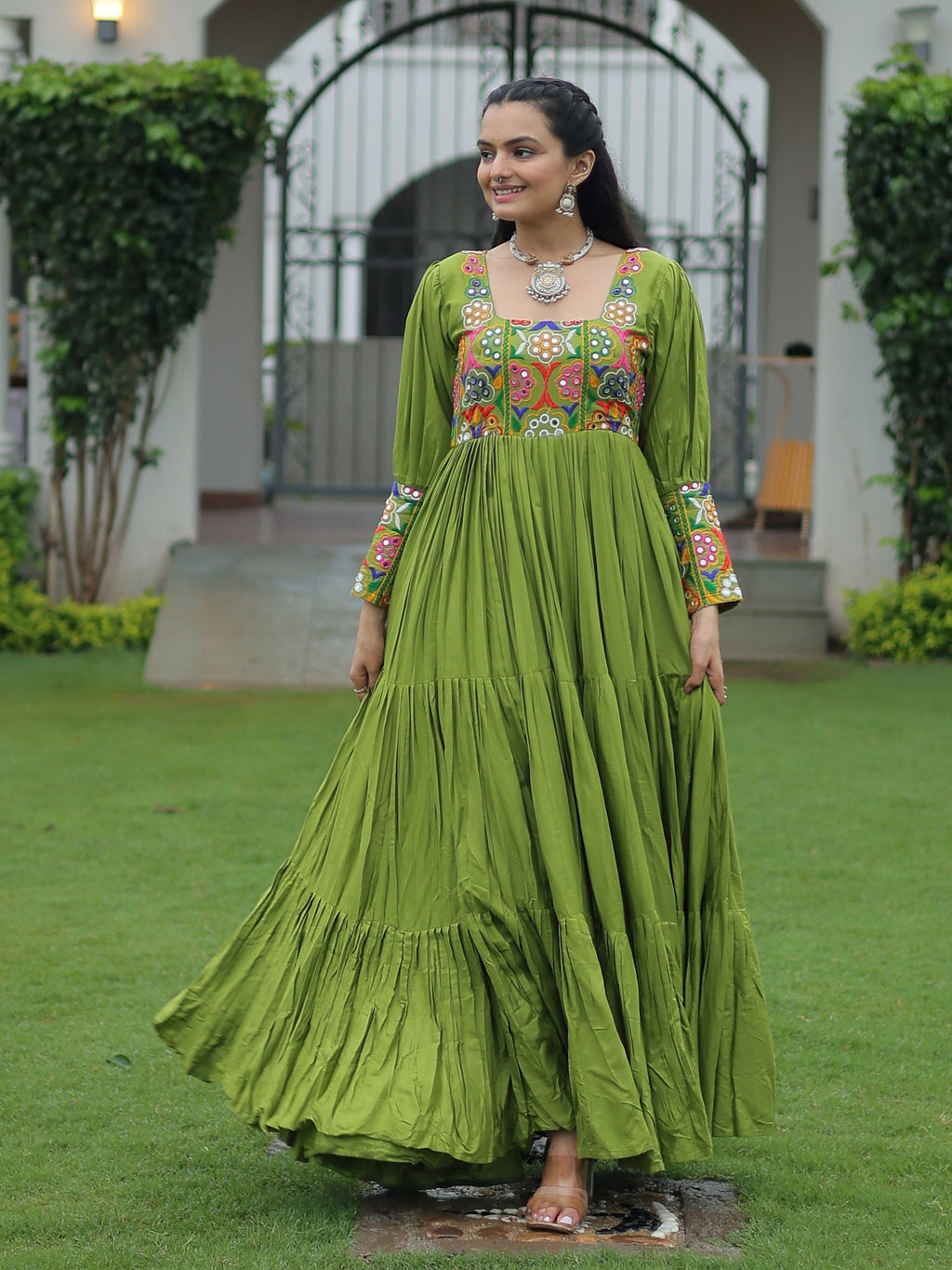 Green rayon flair gown with kutchi gamthi work for navratri