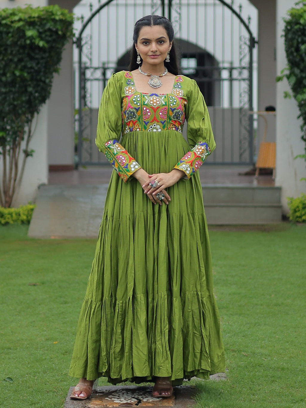 Green rayon flair gown with kutchi gamthi work for navratri