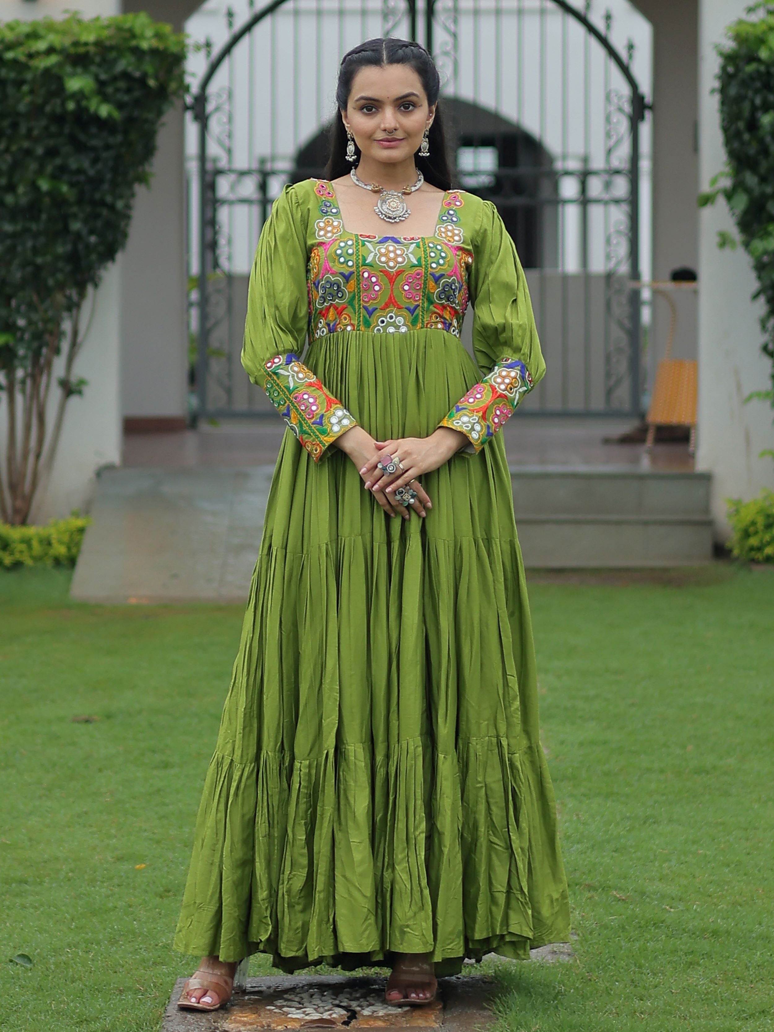 Green rayon flair gown with kutchi gamthi work for navratri