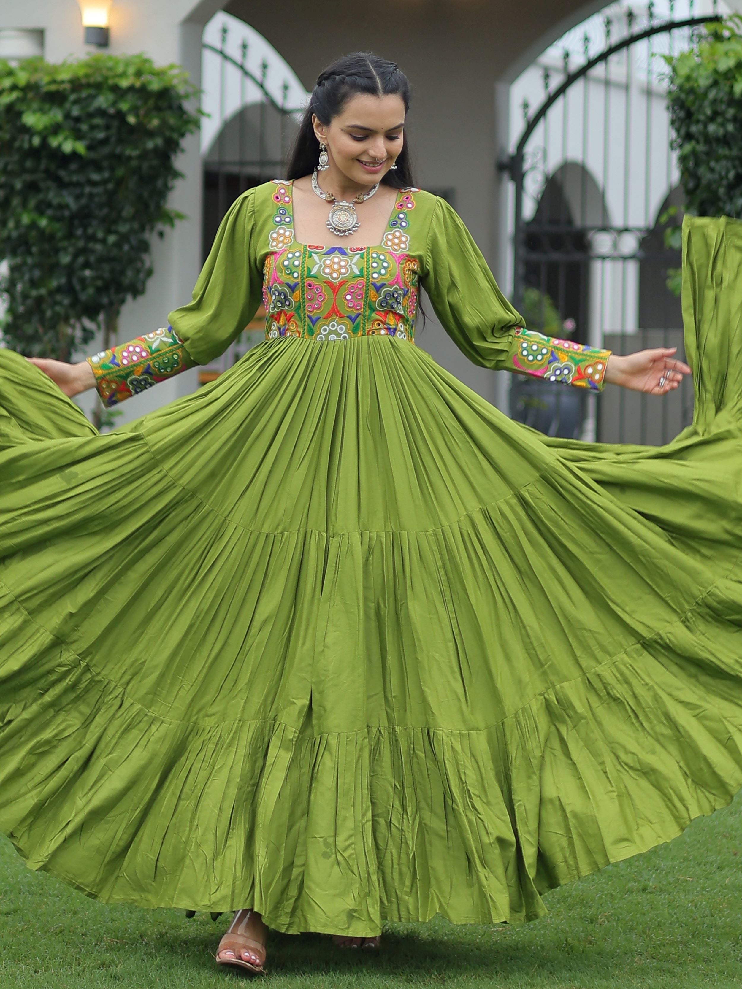 Green rayon flair gown with kutchi gamthi work for navratri