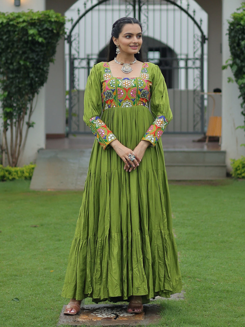 Green rayon flair gown with kutchi gamthi work for navratri