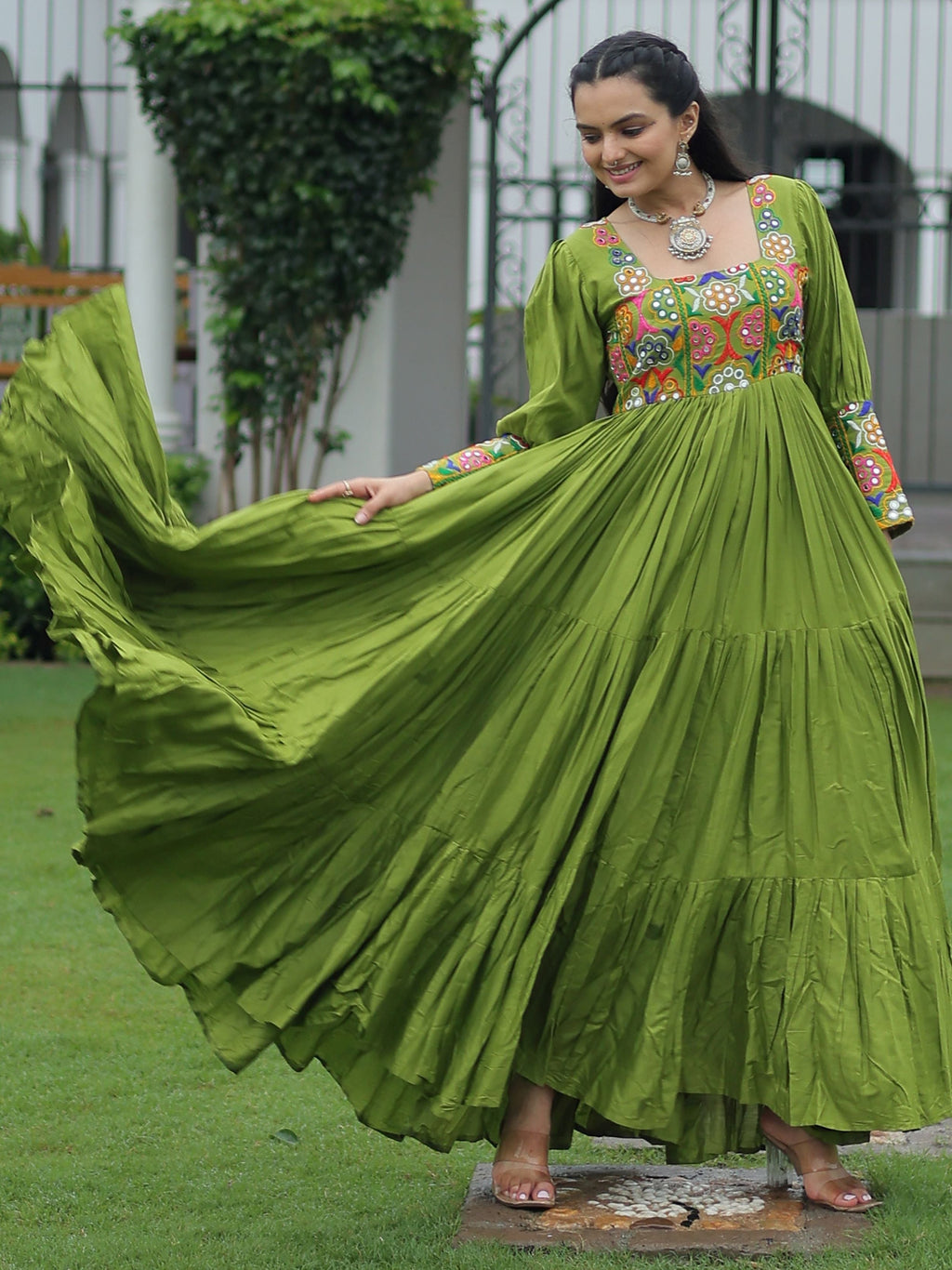 Green rayon flair gown with kutchi gamthi work for navratri