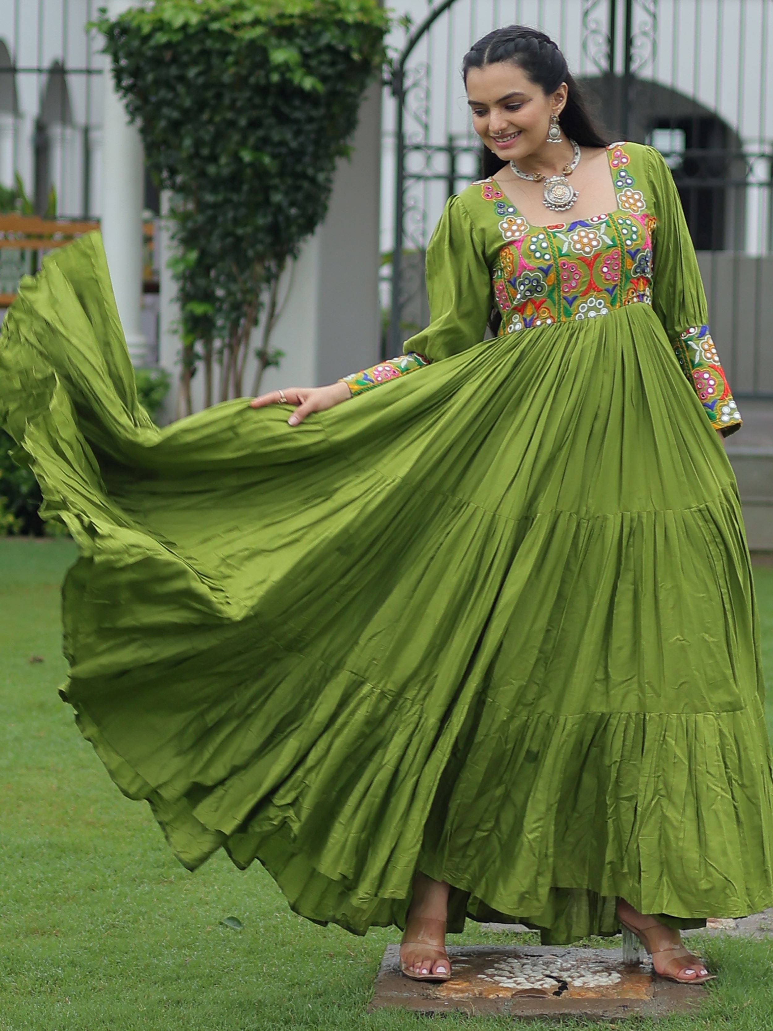 Green rayon flair gown with kutchi gamthi work for navratri