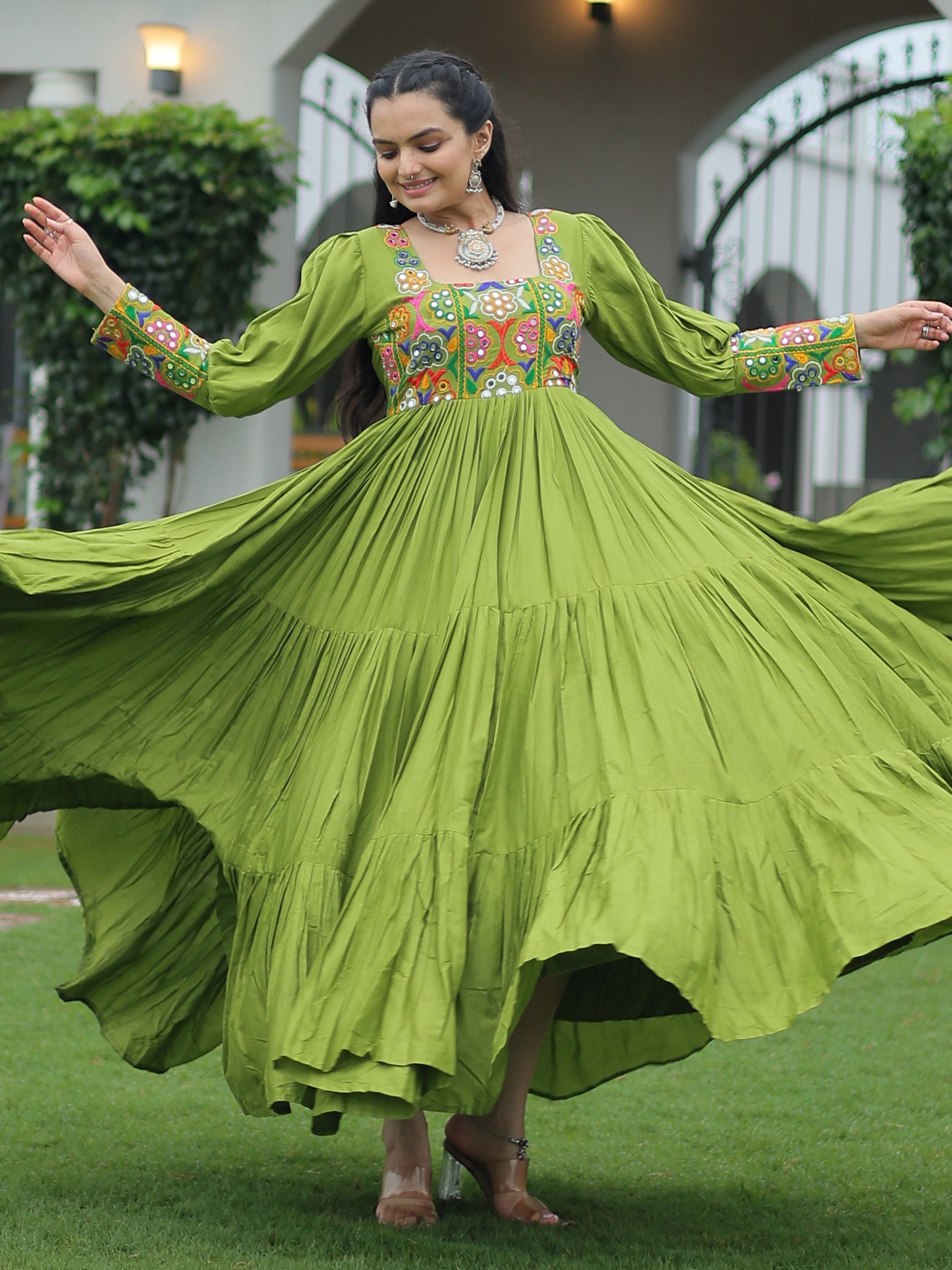 Green rayon flair gown with kutchi gamthi work for navratri