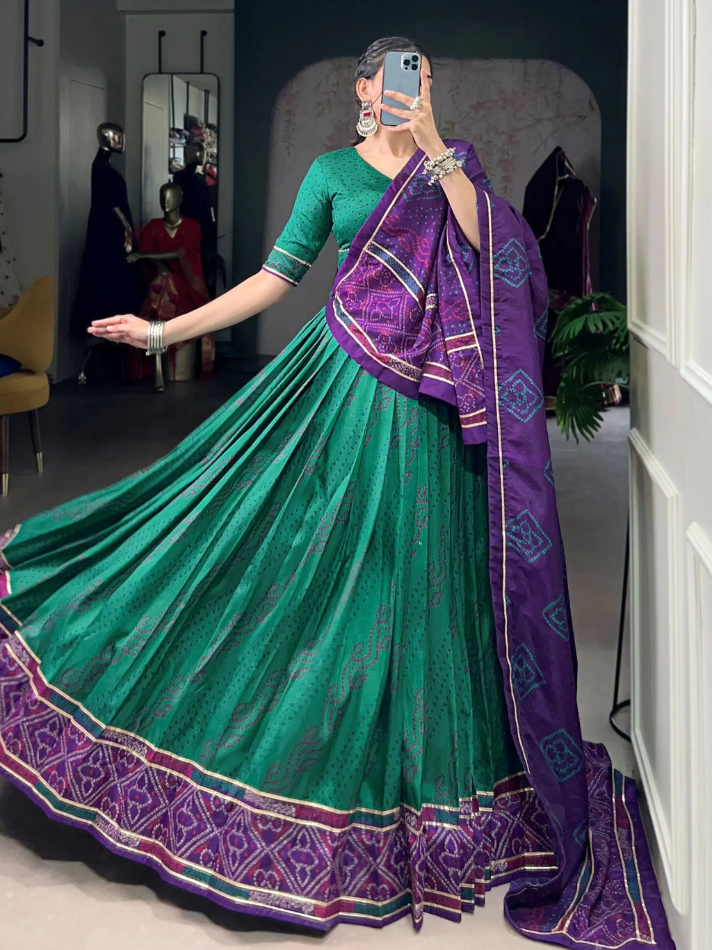 Green silk bandhani print lehenga choli with gotta patti lace work