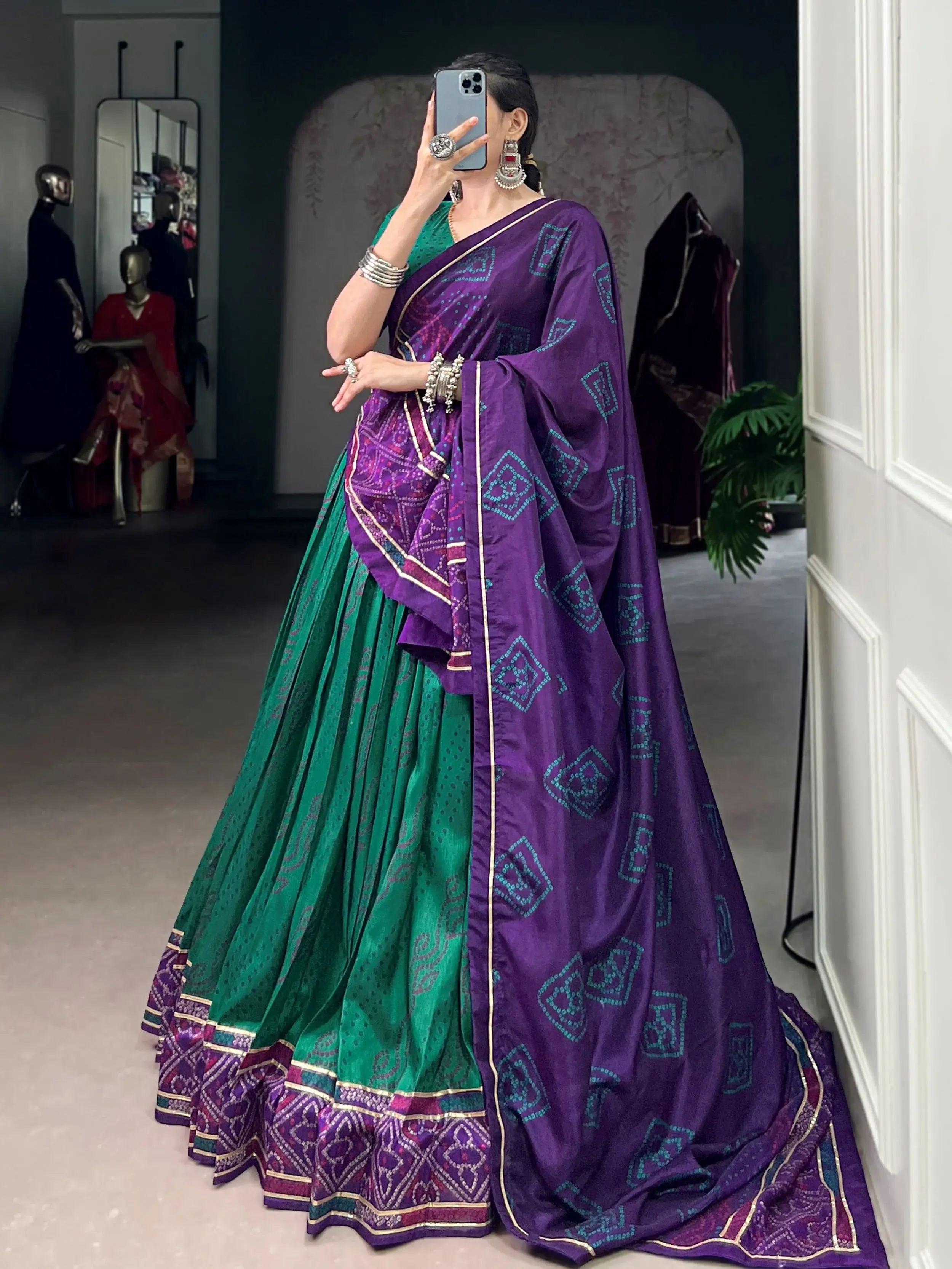 Green silk bandhani print lehenga choli with gotta patti lace work