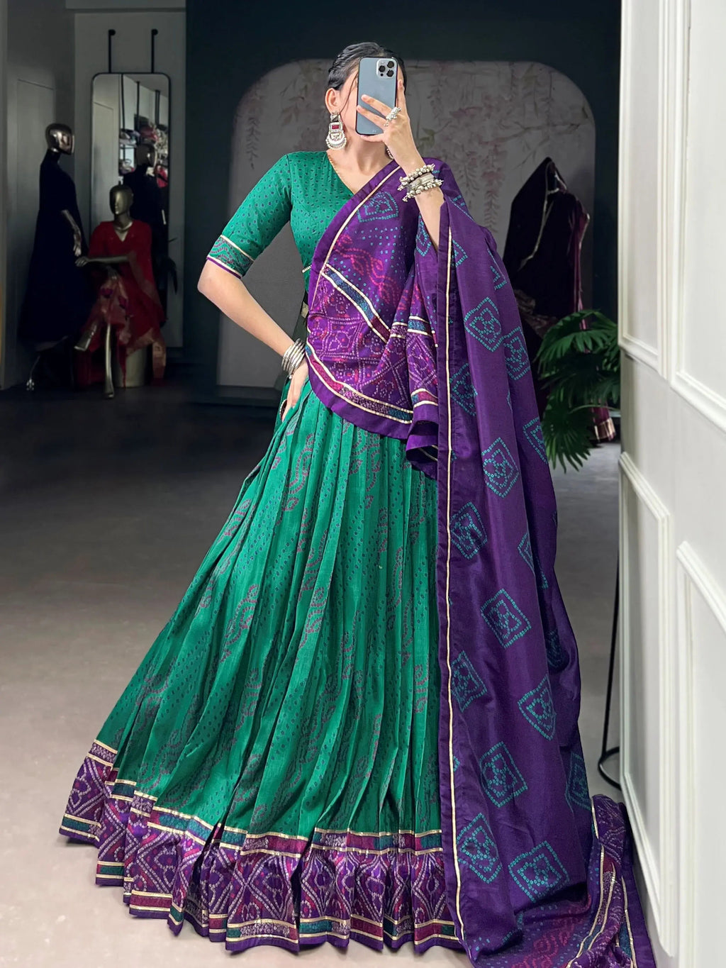 Green silk bandhani print lehenga choli with gotta patti lace work