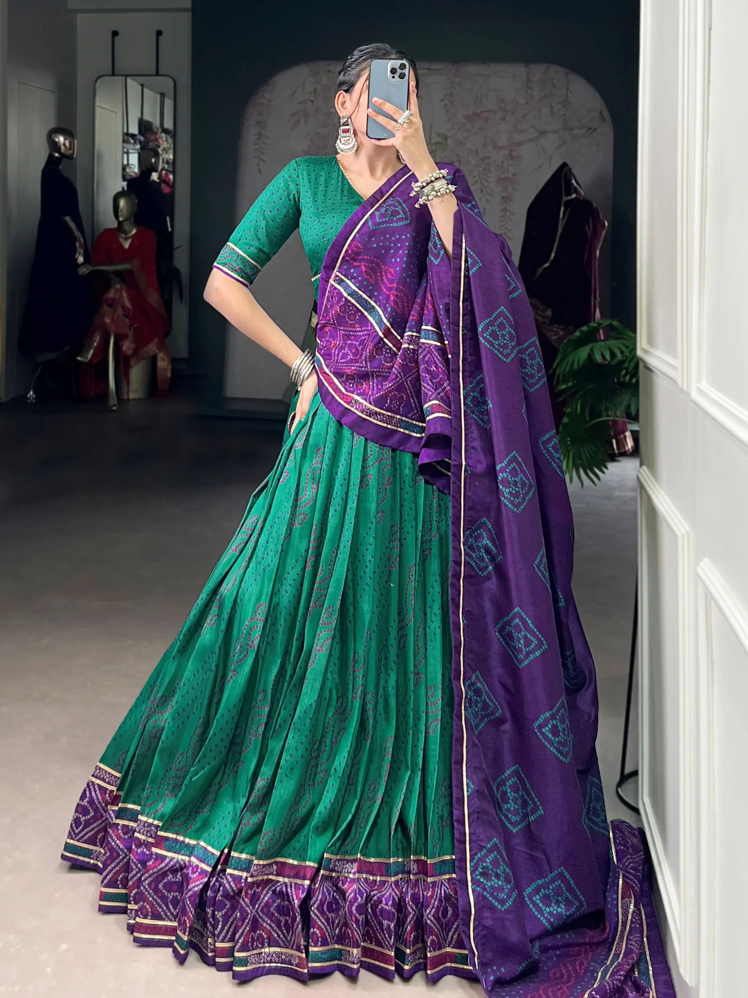 Green silk bandhani print lehenga choli with gotta patti lace work